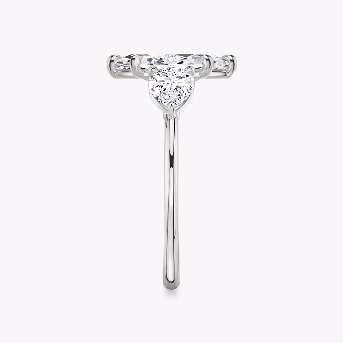 The Three Stone | Marquise | Platinum | bandAccent: Plain | sideStoneCarat: 0.50ct | sideStoneShape: Pear | diamondOrientation: vertical | caratWeight: other