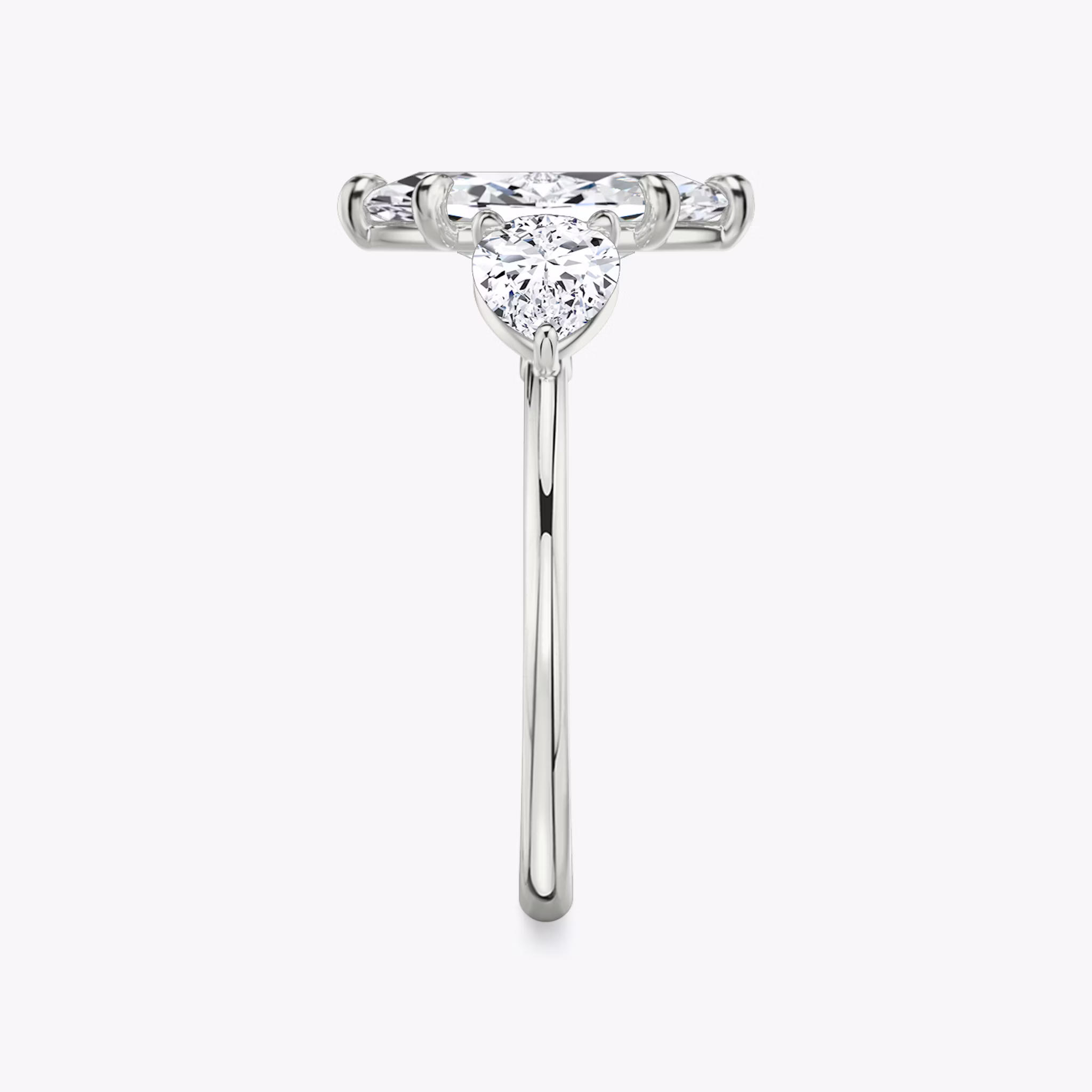 The Three Stone | Marquise | 18k | White Gold | bandAccent: Plain | sideStoneCarat: 0.50ct | sideStoneShape: Pear | diamondOrientation: vertical | caratWeight: other