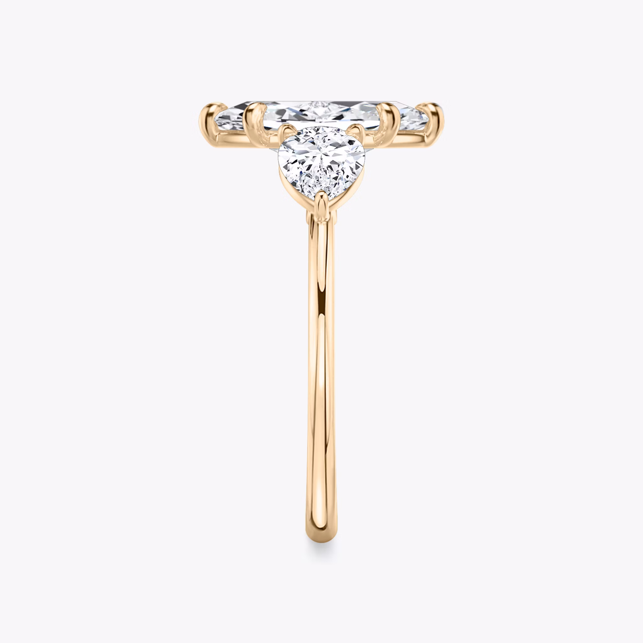 The Three Stone | Marquise | 14k | Rose Gold | bandAccent: Plain | sideStoneCarat: 0.50ct | sideStoneShape: Pear | diamondOrientation: vertical | caratWeight: other