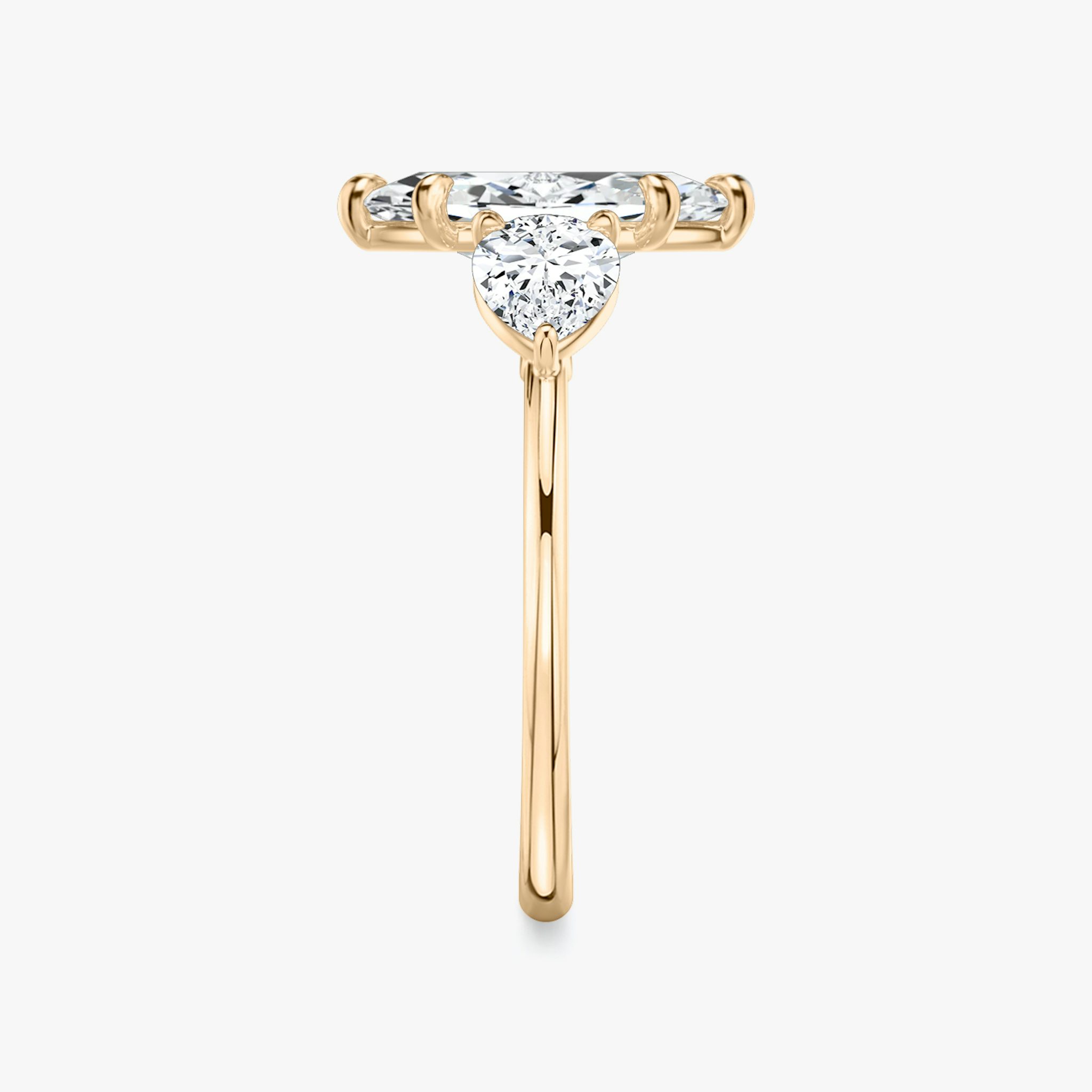 The Three Stone | Marquise | 14k | Rose Gold | bandAccent: Plain | sideStoneCarat: 0.50ct | sideStoneShape: Pear | diamondOrientation: vertical | caratWeight: other