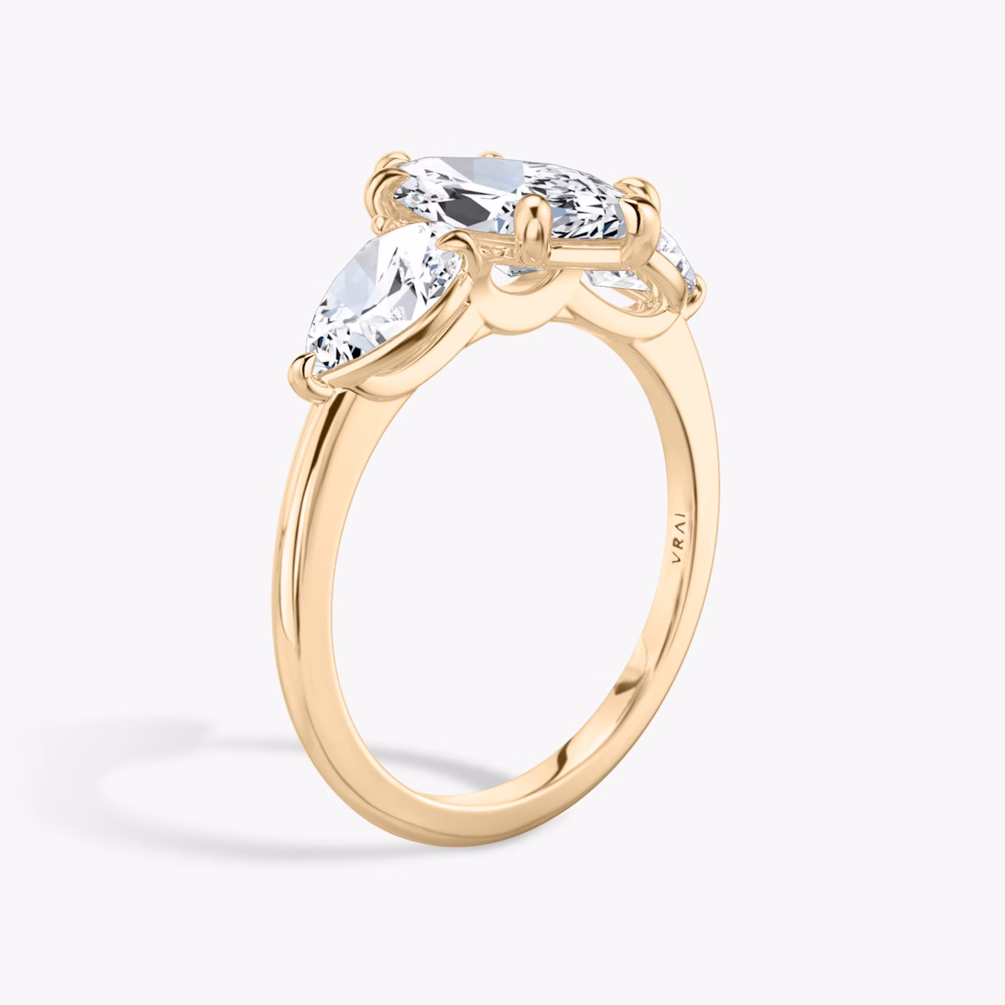 The Three Stone | Marquise | 14k | Rose Gold | bandAccent: Plain | sideStoneCarat: 0.50ct | sideStoneShape: Pear | diamondOrientation: vertical | caratWeight: other