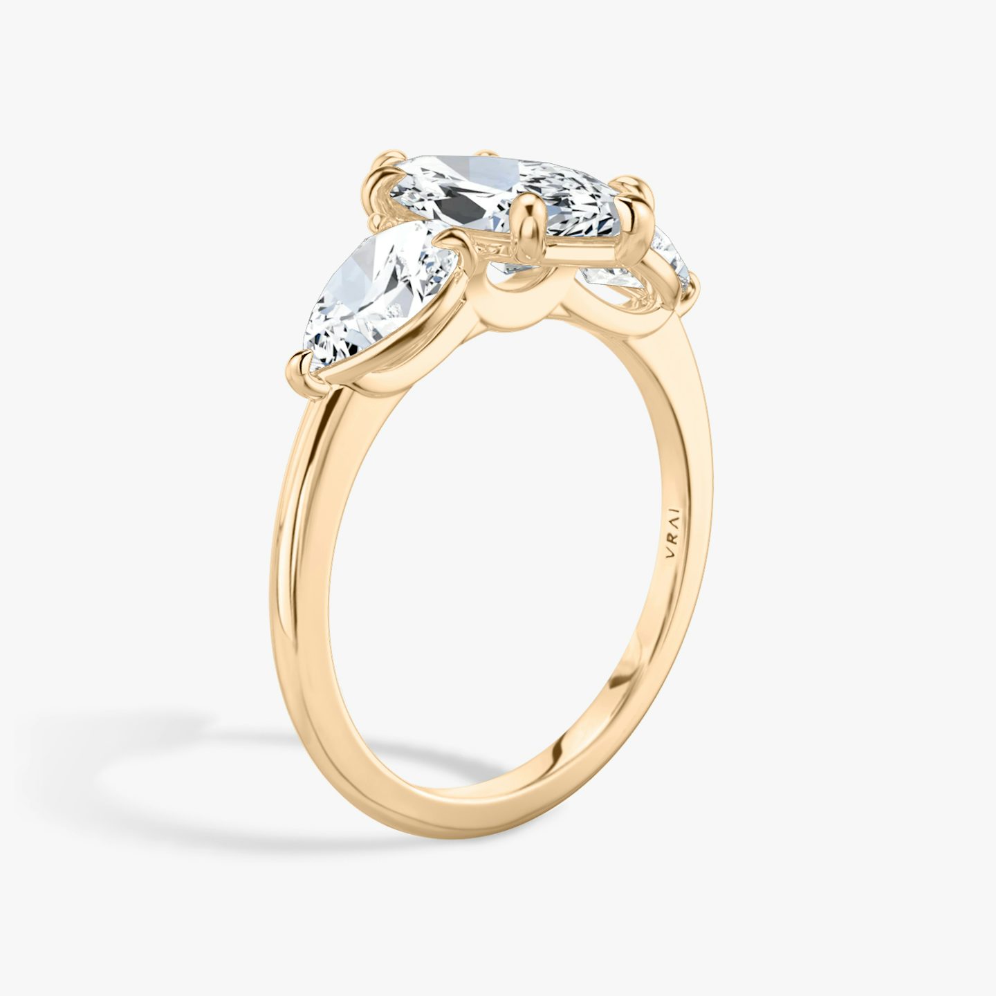 The Three Stone | Marquise | 14k | Rose Gold | bandAccent: Plain | sideStoneCarat: 0.50ct | sideStoneShape: Pear | diamondOrientation: vertical | caratWeight: other