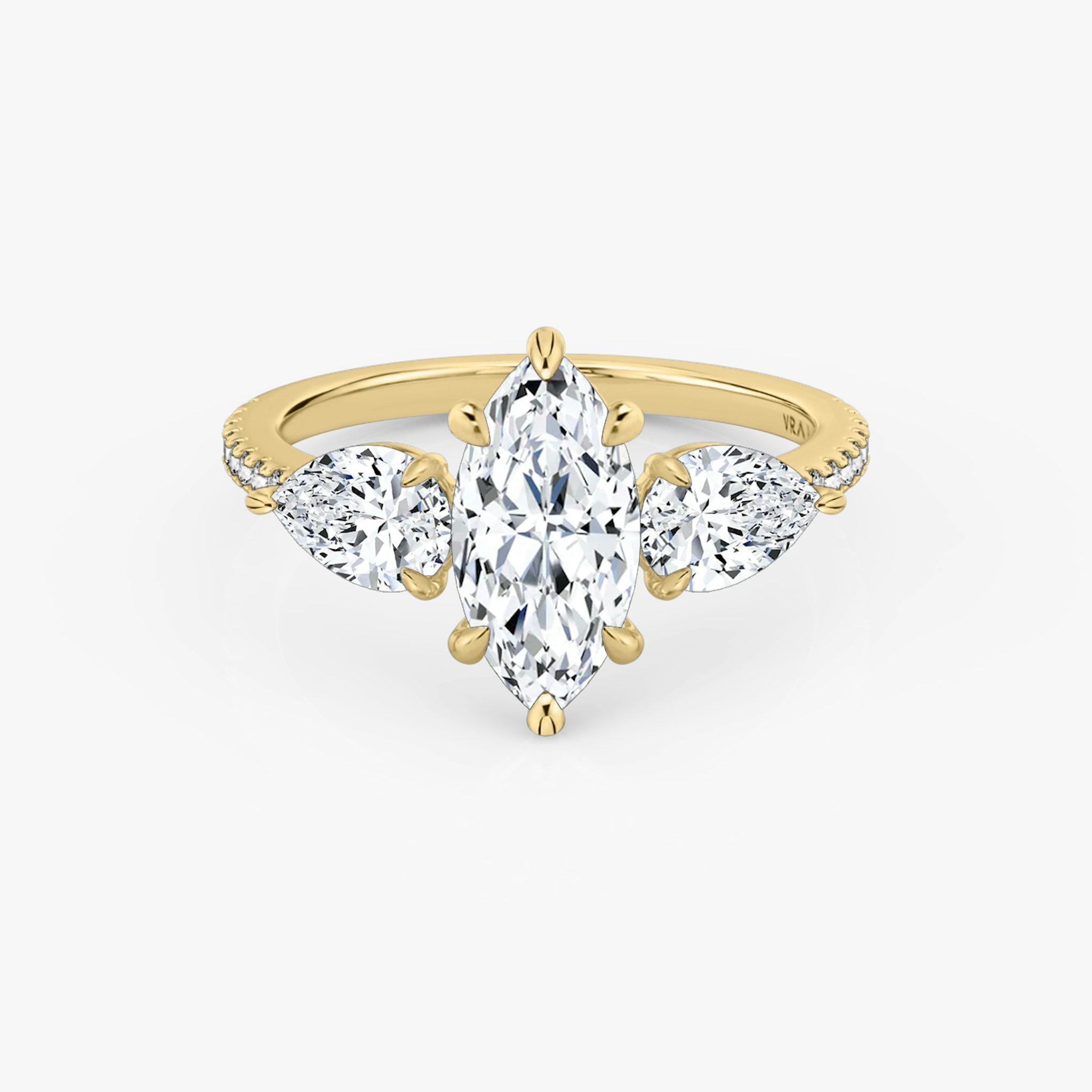 The Three Stone | Marquise | 18k | Yellow Gold | bandAccent: Pavé | sideStoneCarat: 0.50ct | sideStoneShape: Pear | diamondOrientation: vertical | caratWeight: other