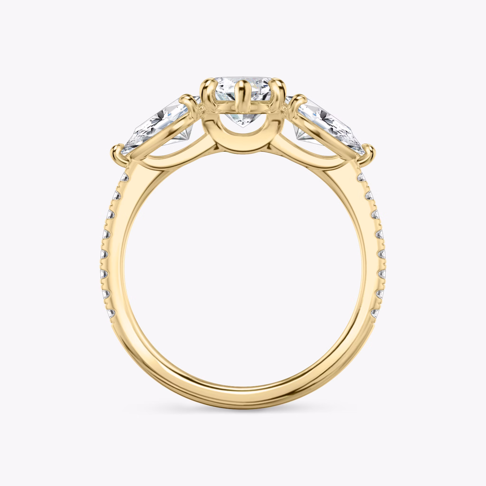The Three Stone | Marquise | 18k | Yellow Gold | bandAccent: Pavé | sideStoneCarat: 0.50ct | sideStoneShape: Pear | diamondOrientation: vertical | caratWeight: other