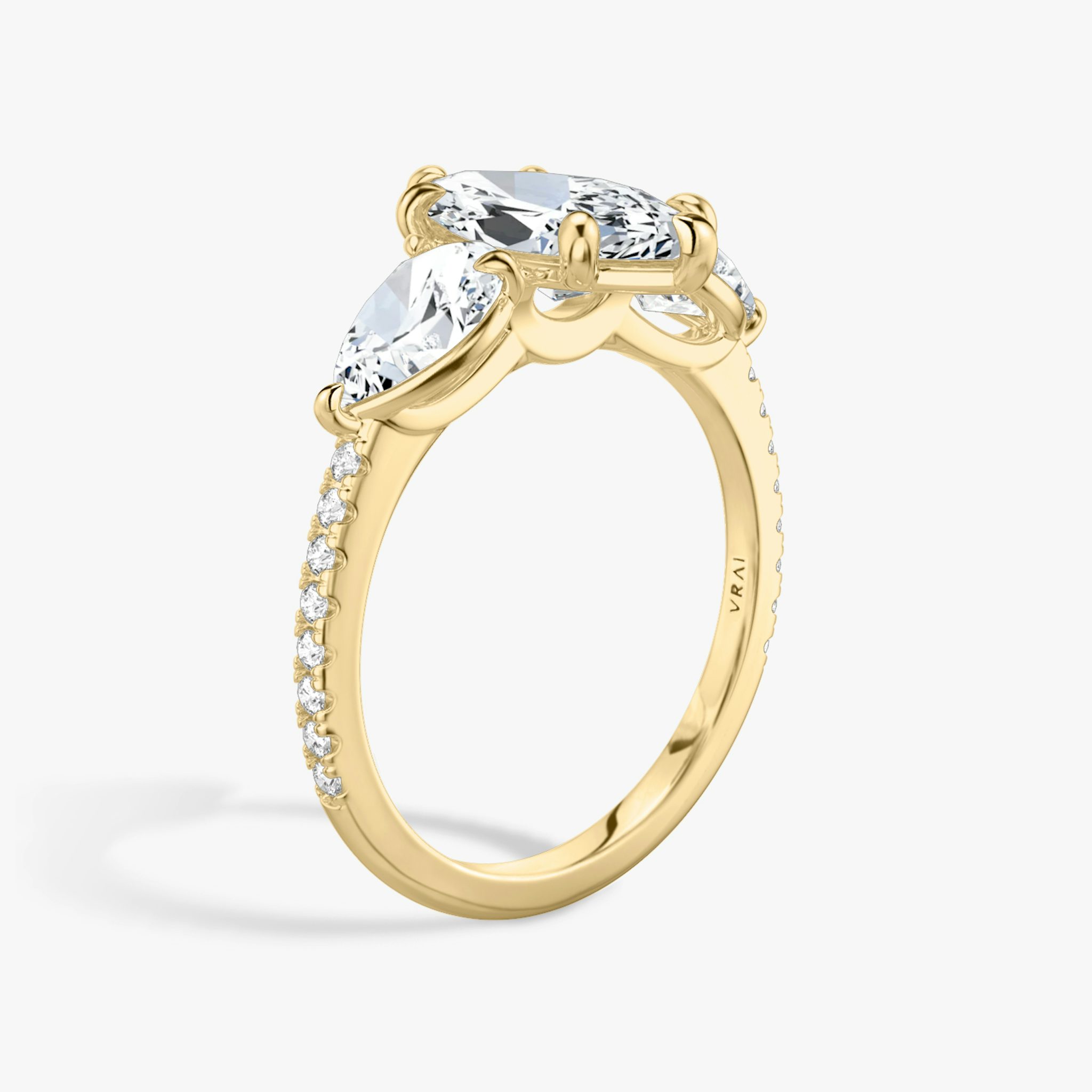 The Three Stone | Marquise | 18k | Yellow Gold | bandAccent: Pavé | sideStoneCarat: 0.50ct | sideStoneShape: Pear | diamondOrientation: vertical | caratWeight: other