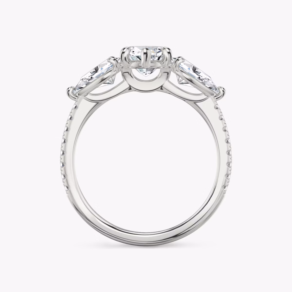 The Three Stone | Marquise | Platinum | bandAccent: Pavé | sideStoneCarat: 0.50ct | sideStoneShape: Pear | diamondOrientation: vertical | caratWeight: other