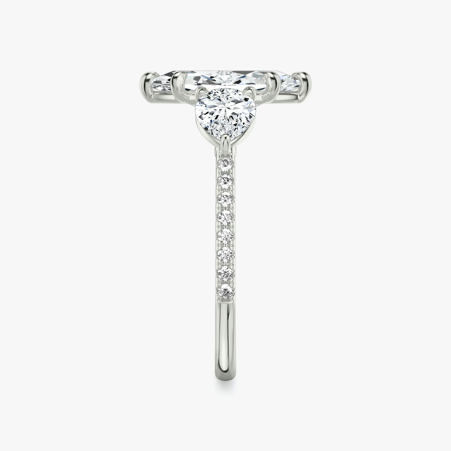 The Three Stone | Marquise | Platinum | bandAccent: Pavé | sideStoneCarat: 0.50ct | sideStoneShape: Pear | diamondOrientation: vertical | caratWeight: other