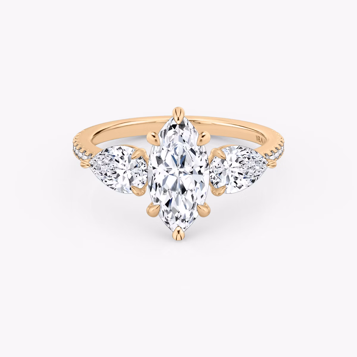 The Three Stone | Marquise | 14k | Rose Gold | bandAccent: Pavé | sideStoneCarat: 0.50ct | sideStoneShape: Pear | diamondOrientation: vertical | caratWeight: other