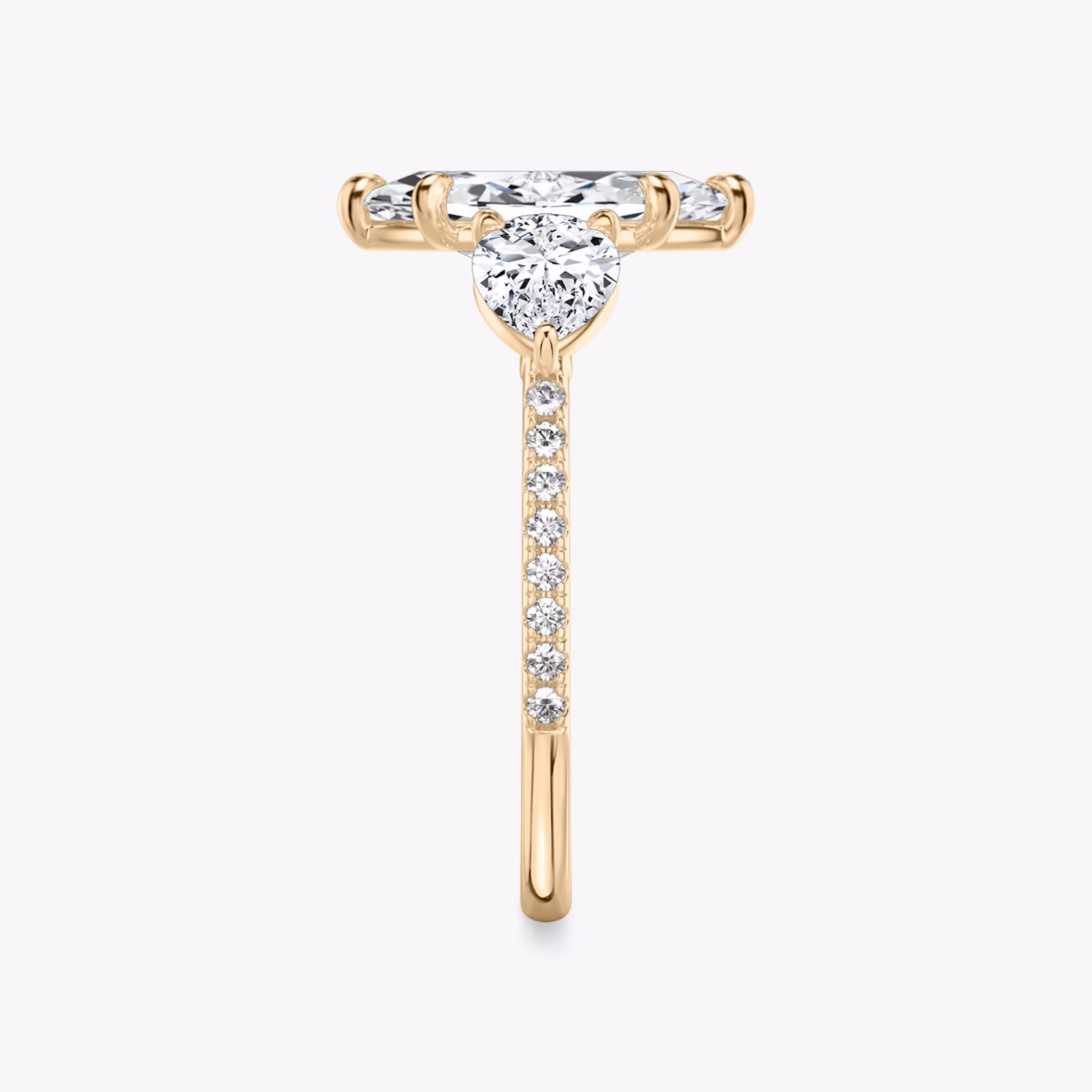 The Three Stone | Marquise | 14k | Rose Gold | bandAccent: Pavé | sideStoneCarat: 0.50ct | sideStoneShape: Pear | diamondOrientation: vertical | caratWeight: other