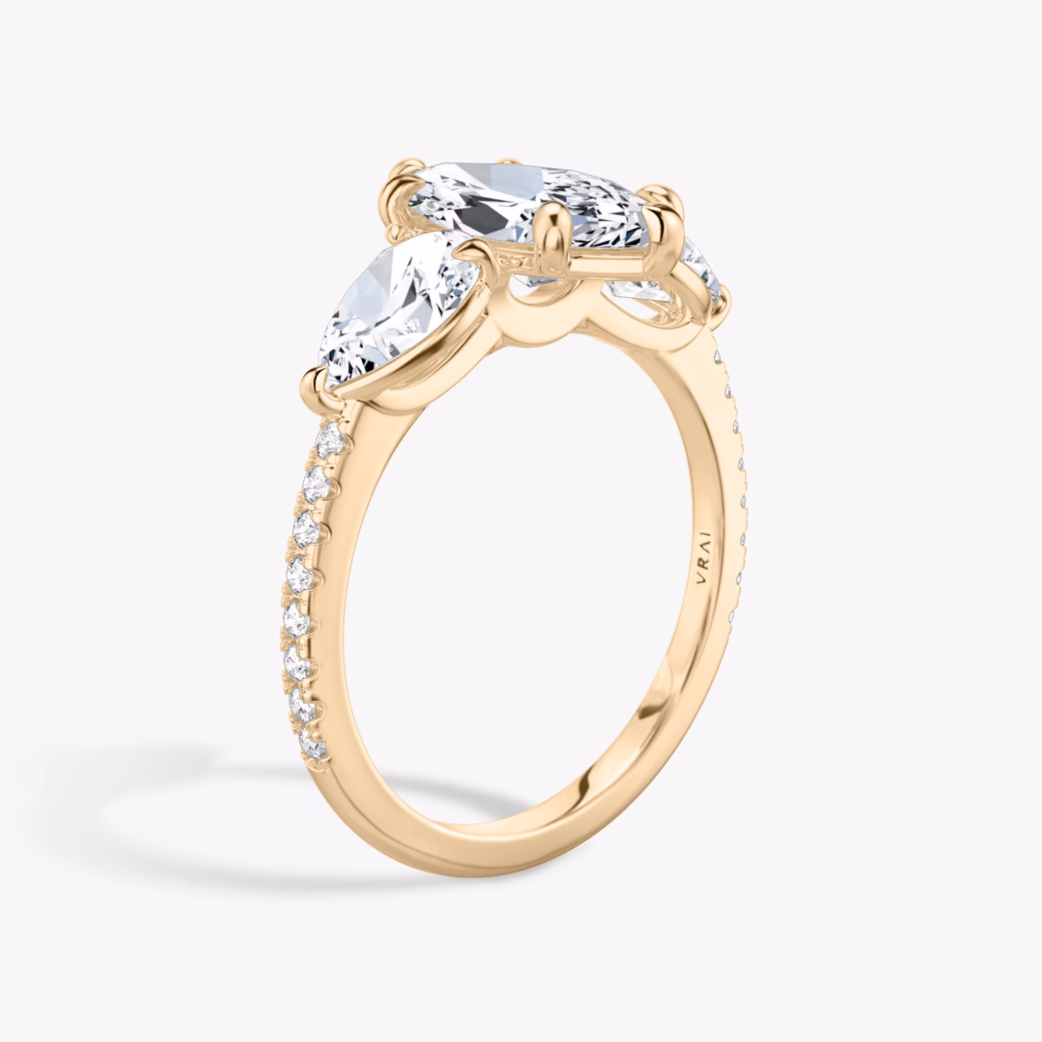 The Three Stone | Marquise | 14k | Rose Gold | bandAccent: Pavé | sideStoneCarat: 0.50ct | sideStoneShape: Pear | diamondOrientation: vertical | caratWeight: other