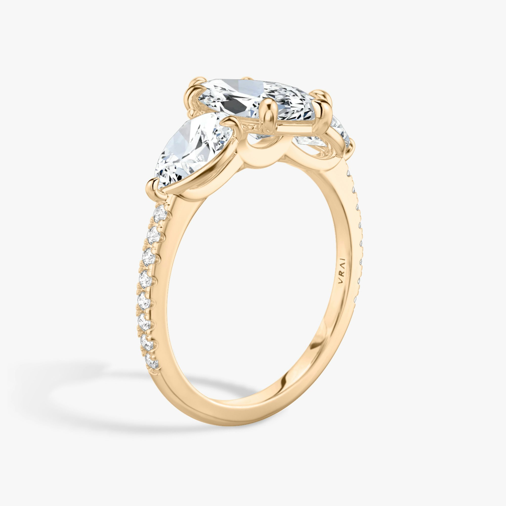 The Three Stone | Marquise | 14k | Rose Gold | bandAccent: Pavé | sideStoneCarat: 0.50ct | sideStoneShape: Pear | diamondOrientation: vertical | caratWeight: other