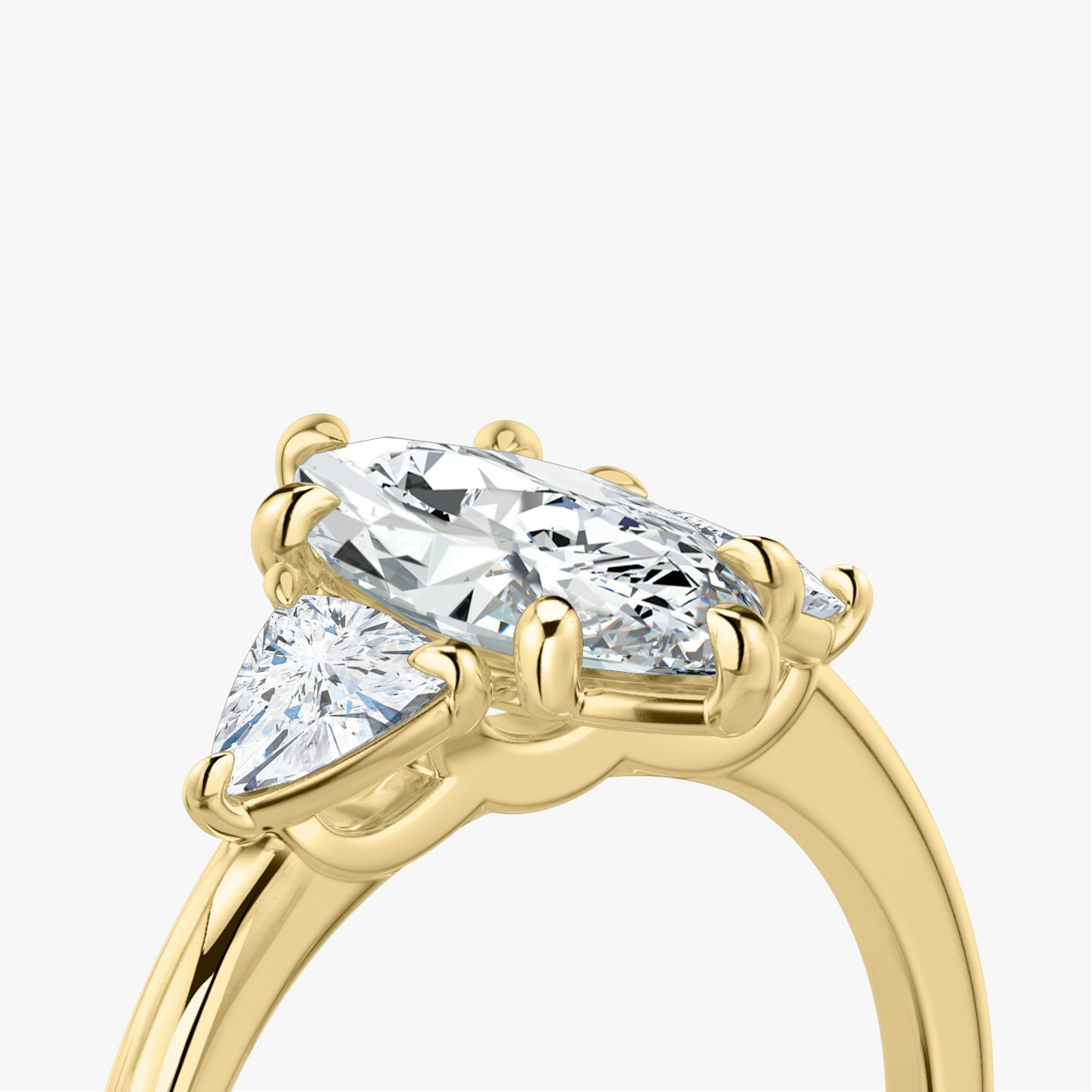 The Three Stone | Marquise | 18k | Yellow Gold | bandAccent: Plain | sideStoneCarat: 0.25ct | sideStoneShape: Trillion | diamondOrientation: vertical | caratWeight: other