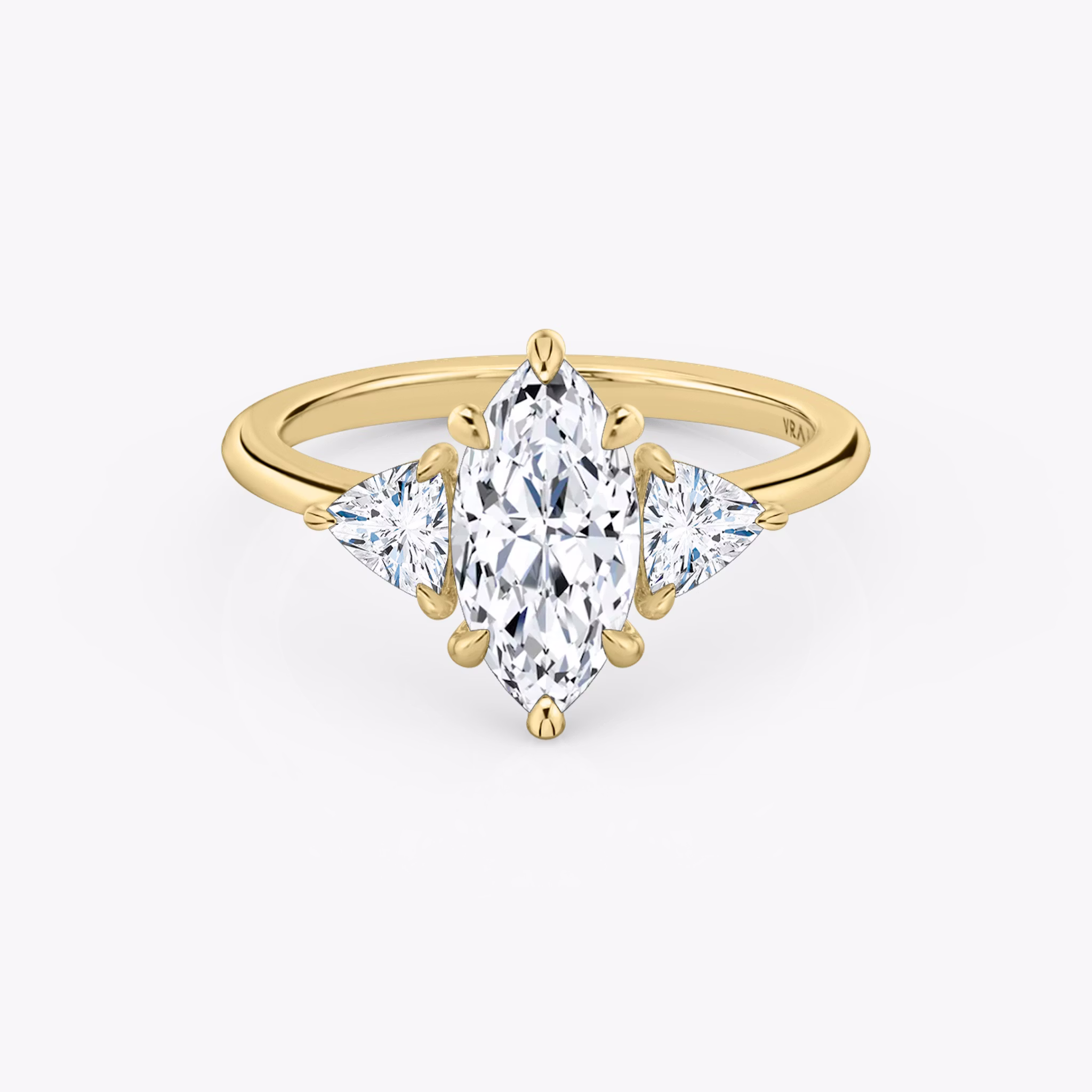 The Three Stone | Marquise | 18k | Yellow Gold | bandAccent: Plain | sideStoneCarat: 0.25ct | sideStoneShape: Trillion | diamondOrientation: vertical | caratWeight: other