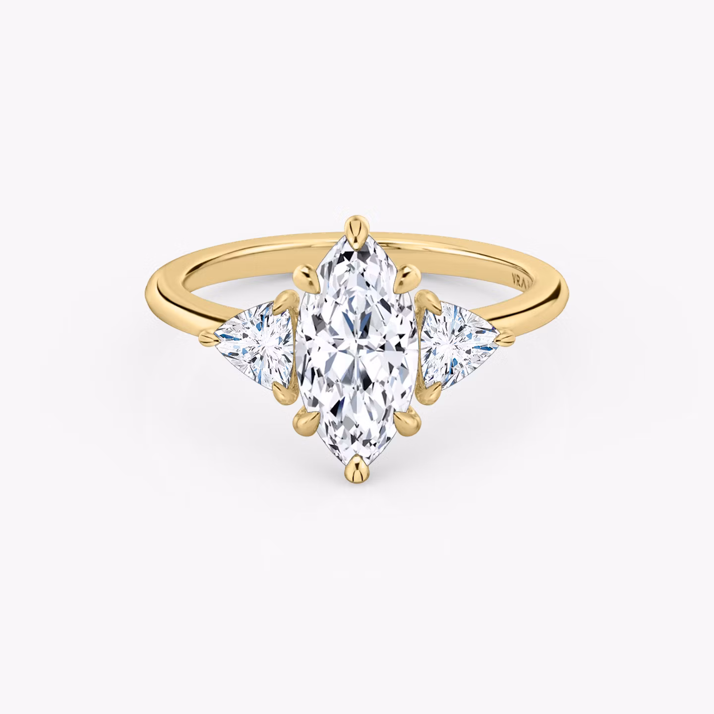 The Three Stone | Marquise | 18k | Yellow Gold | bandAccent: Plain | sideStoneCarat: 0.25ct | sideStoneShape: Trillion | diamondOrientation: vertical | caratWeight: other