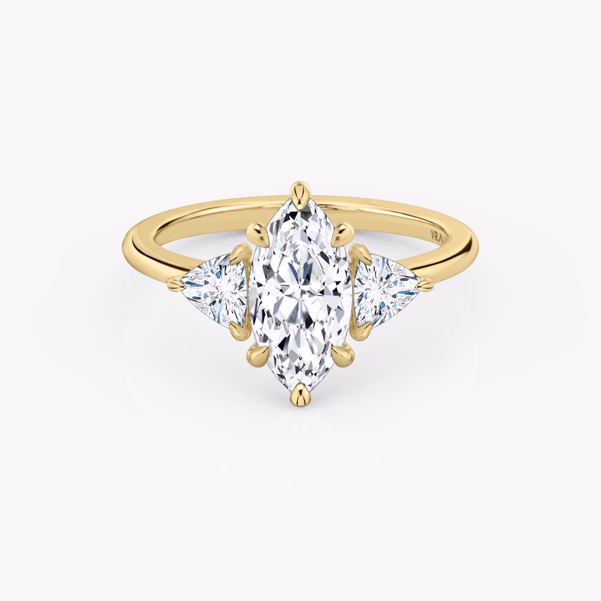 The Three Stone | Marquise | 18k | Yellow Gold | bandAccent: Plain | sideStoneCarat: 0.25ct | sideStoneShape: Trillion | diamondOrientation: vertical | caratWeight: other