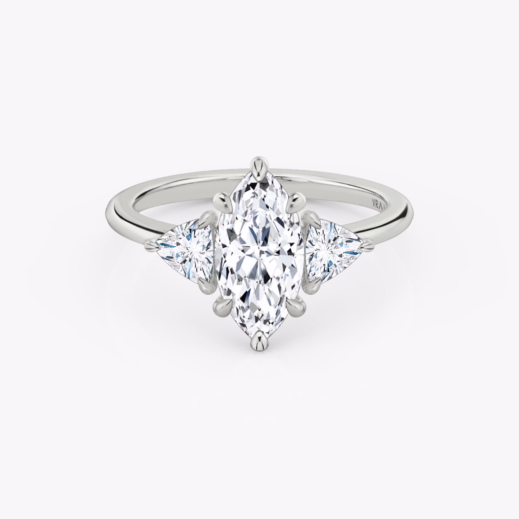 The Three Stone | Marquise | 18k | White Gold | bandAccent: Plain | sideStoneCarat: 0.25ct | sideStoneShape: Trillion | diamondOrientation: vertical | caratWeight: other
