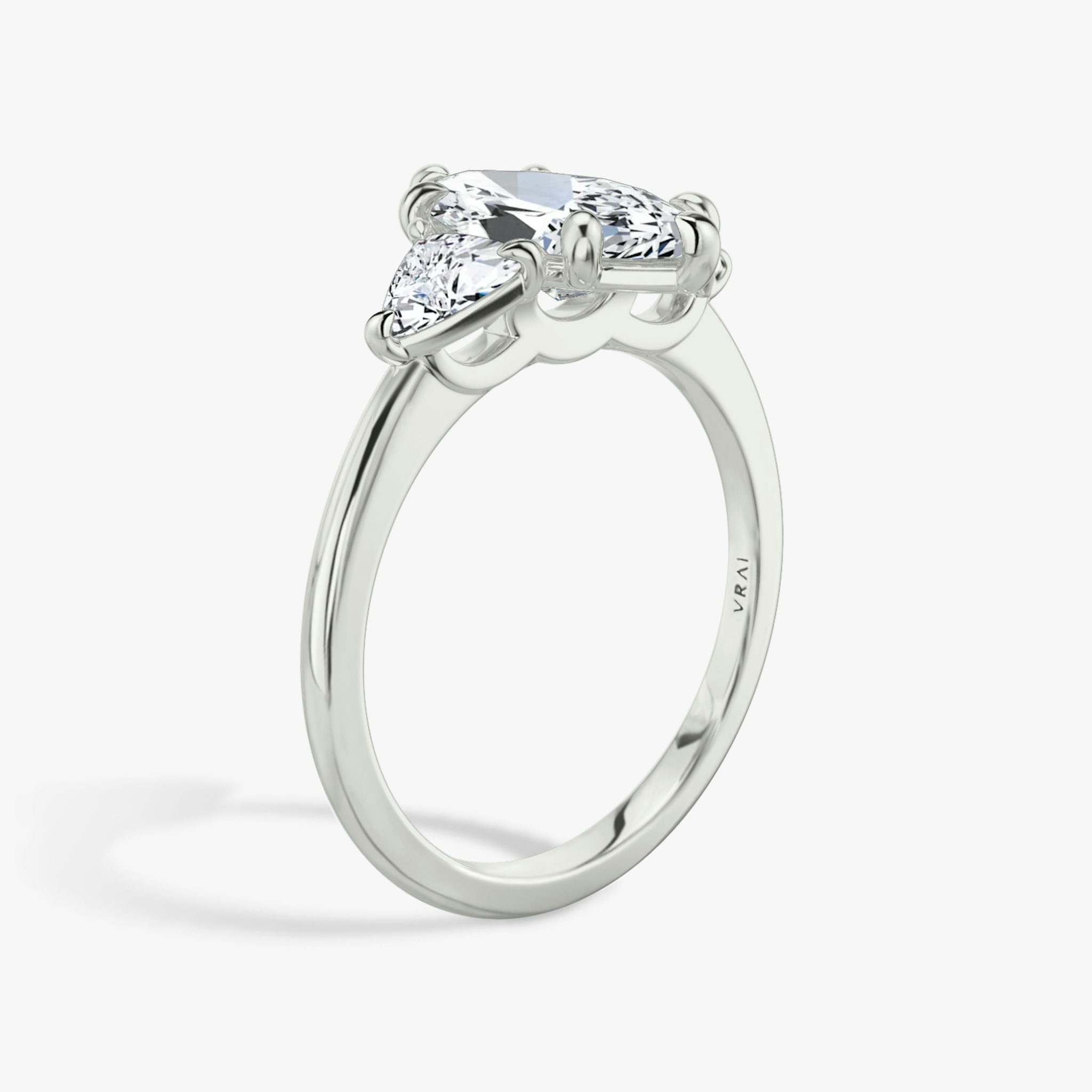 The Three Stone | Marquise | 18k | White Gold | bandAccent: Plain | sideStoneCarat: 0.25ct | sideStoneShape: Trillion | diamondOrientation: vertical | caratWeight: other