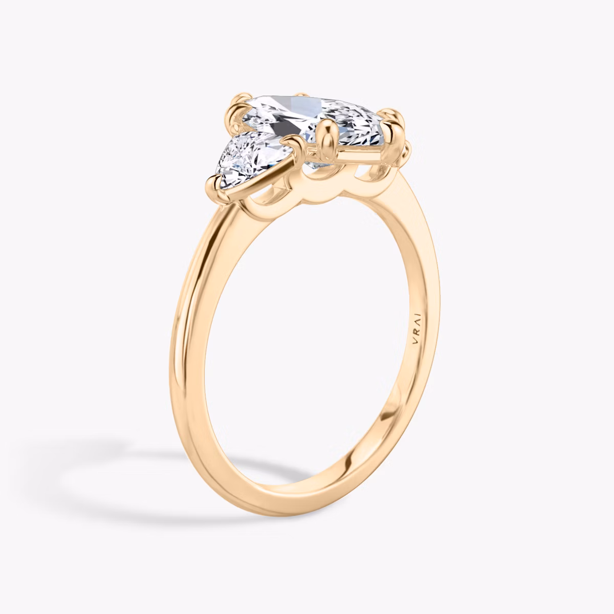 The Three Stone | Marquise | 14k | Rose Gold | bandAccent: Plain | sideStoneCarat: 0.25ct | sideStoneShape: Trillion | diamondOrientation: vertical | caratWeight: other