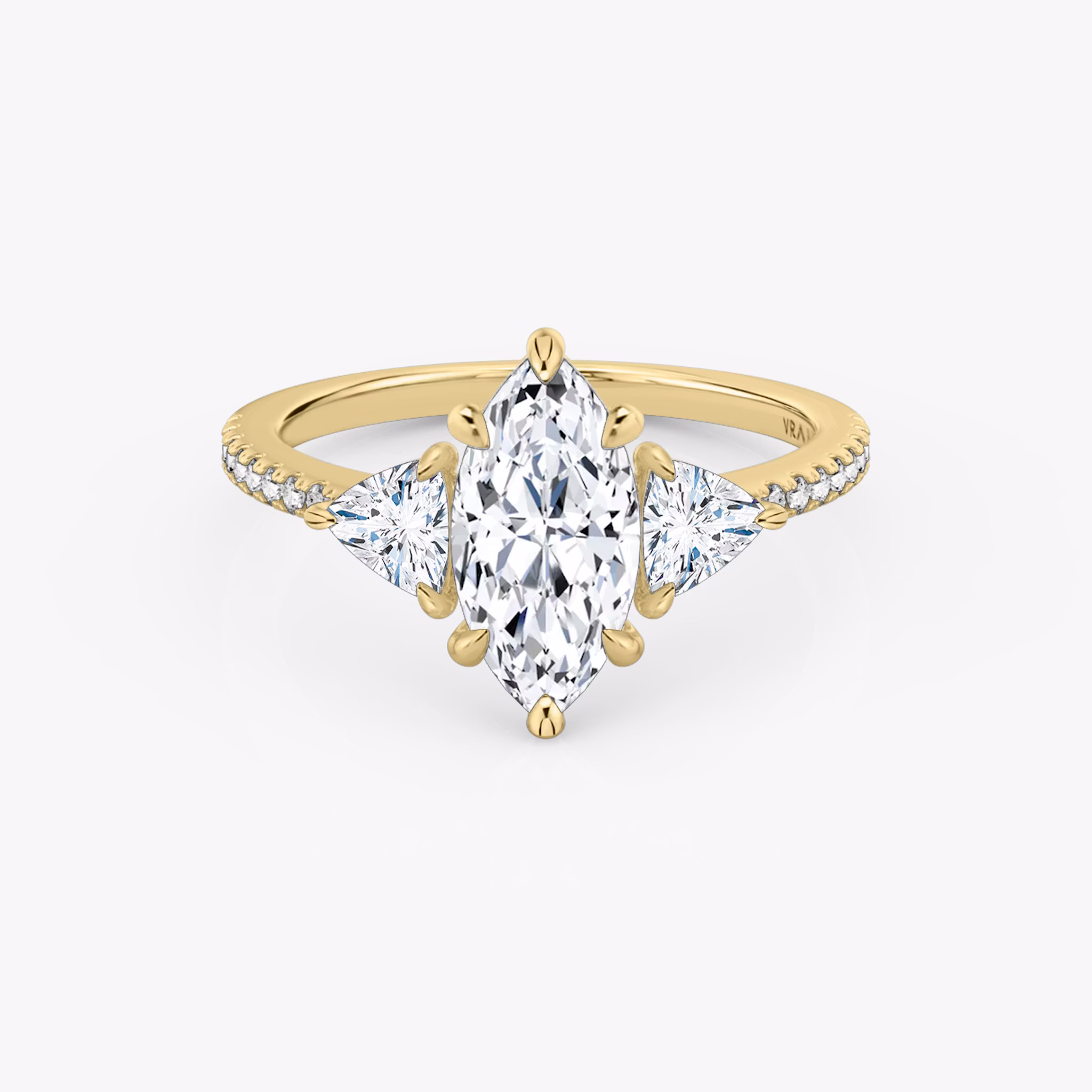 The Three Stone | Marquise | 18k | Yellow Gold | bandAccent: Pavé | sideStoneCarat: 0.25ct | sideStoneShape: Trillion | diamondOrientation: vertical | caratWeight: other