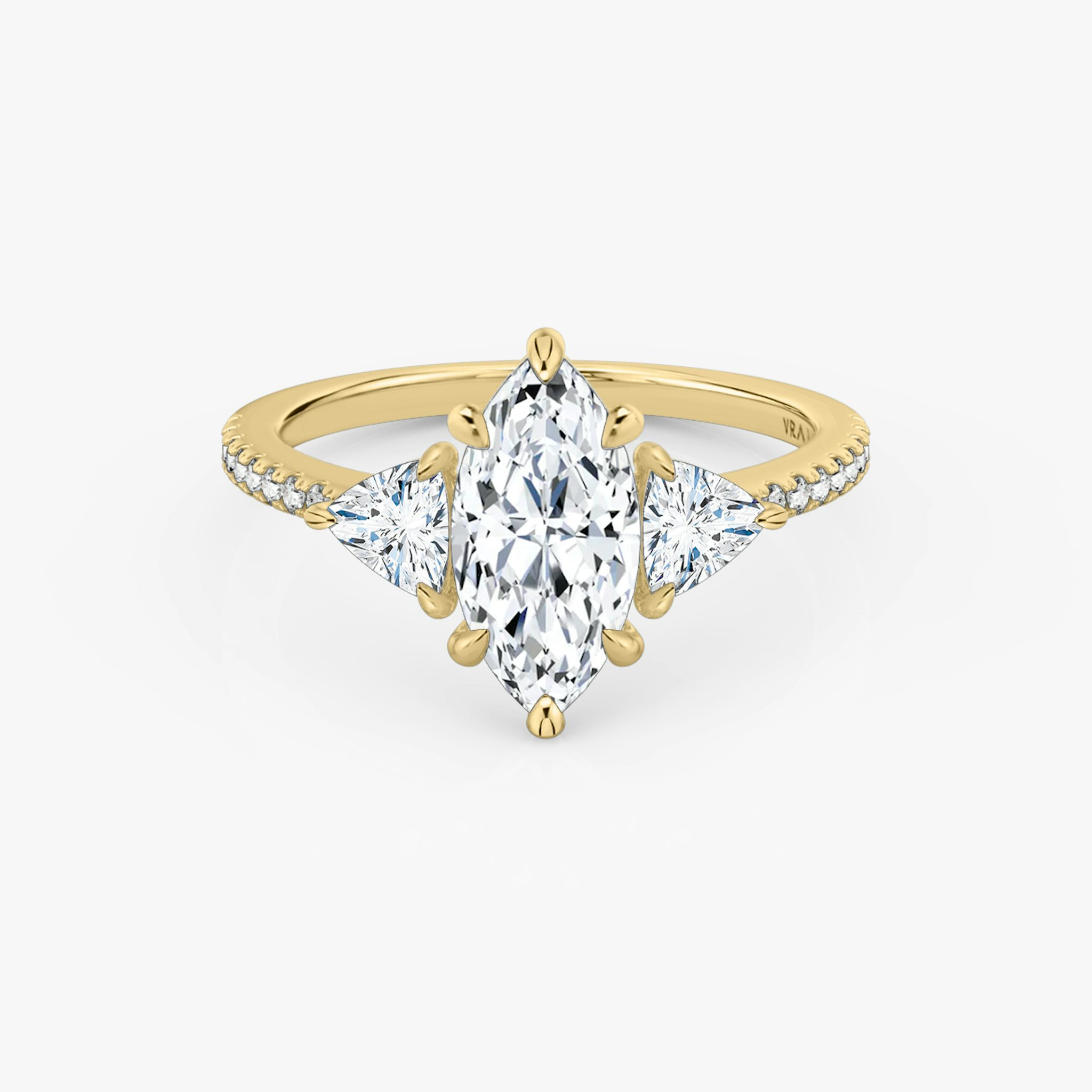 The Three Stone | Marquise | 18k | Yellow Gold | bandAccent: Pavé | sideStoneCarat: 0.25ct | sideStoneShape: Trillion | diamondOrientation: vertical | caratWeight: other
