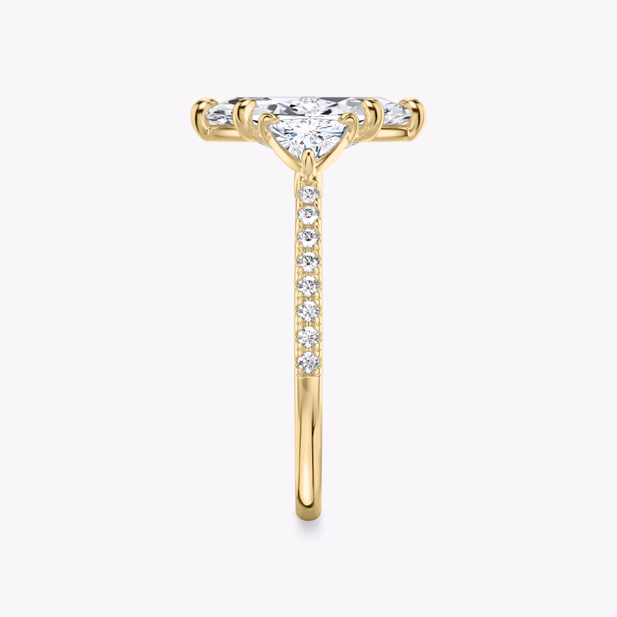 The Three Stone | Marquise | 18k | Yellow Gold | bandAccent: Pavé | sideStoneCarat: 0.25ct | sideStoneShape: Trillion | diamondOrientation: vertical | caratWeight: other