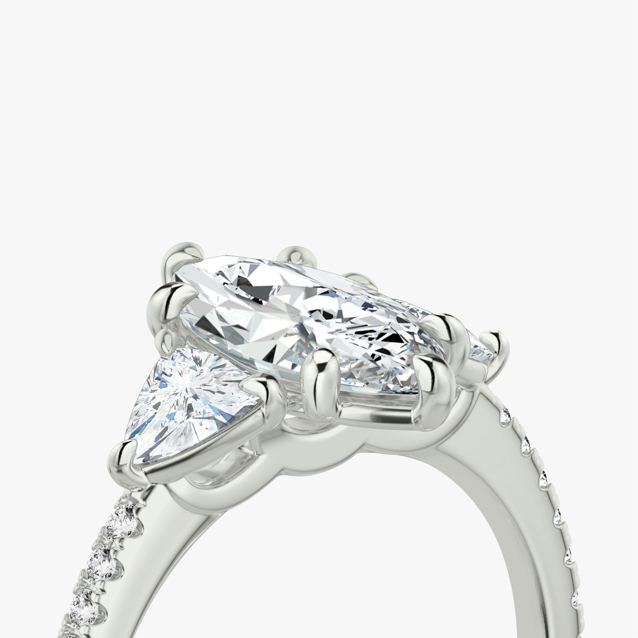 The Three Stone | Marquise | 18k | White Gold | bandAccent: Pavé | sideStoneCarat: 0.25ct | sideStoneShape: Trillion | diamondOrientation: vertical | caratWeight: other