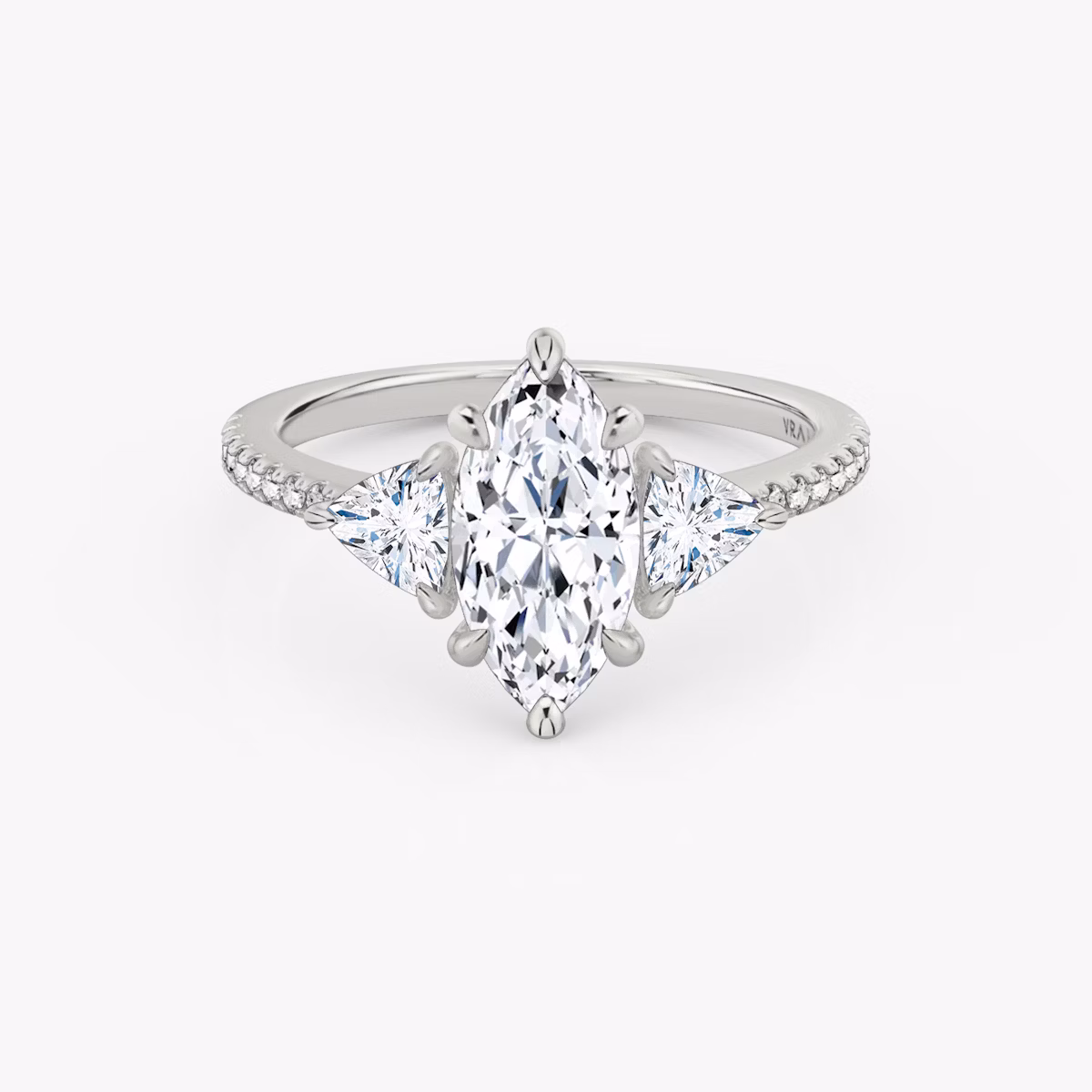 The Three Stone | Marquise | Platinum | bandAccent: Pavé | sideStoneCarat: 0.25ct | sideStoneShape: Trillion | diamondOrientation: vertical | caratWeight: other