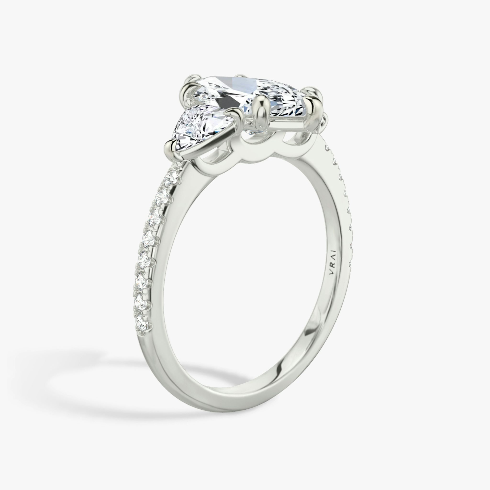 The Three Stone | Marquise | 18k | White Gold | bandAccent: Pavé | sideStoneCarat: 0.25ct | sideStoneShape: Trillion | diamondOrientation: vertical | caratWeight: other