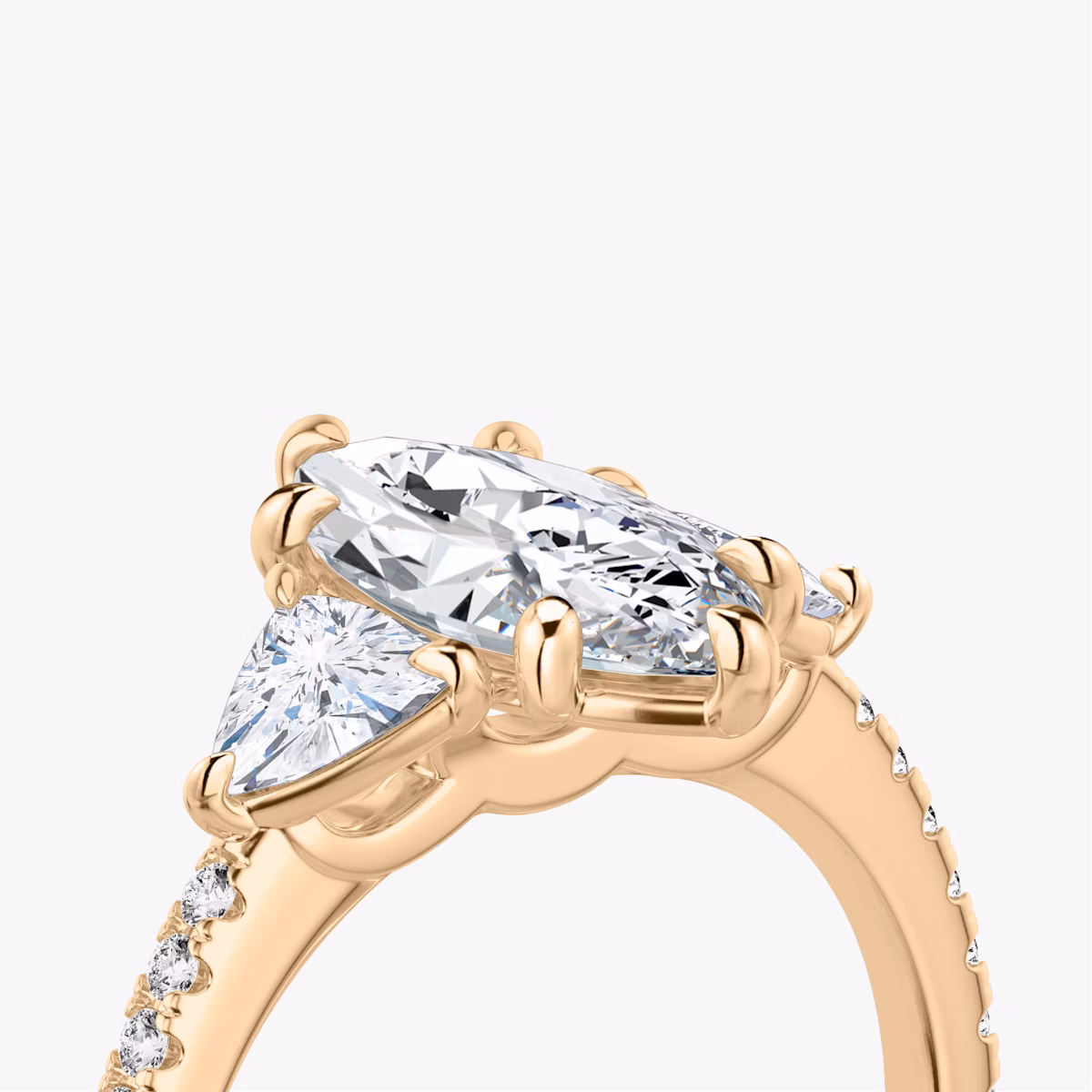 The Three Stone | Marquise | 14k | Rose Gold | bandAccent: Pavé | sideStoneCarat: 0.25ct | sideStoneShape: Trillion | diamondOrientation: vertical | caratWeight: other