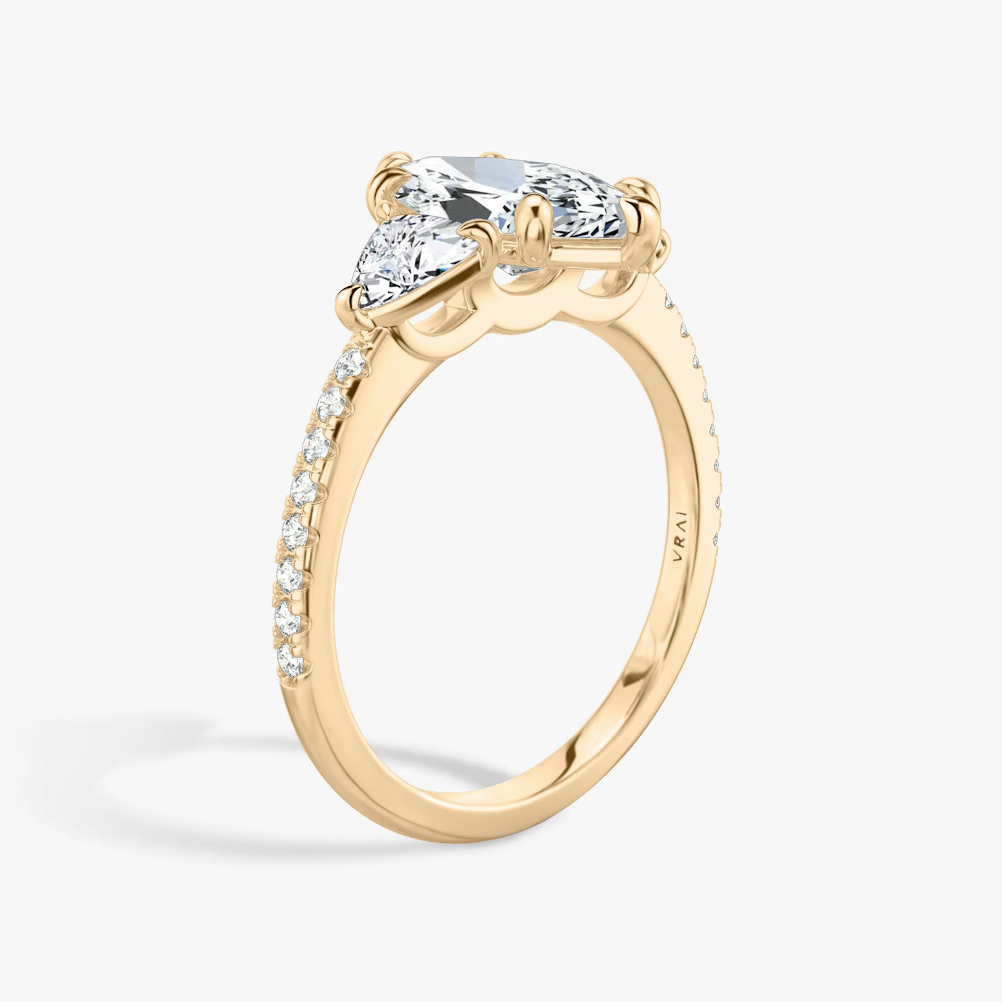 The Three Stone | Marquise | 14k | Rose Gold | bandAccent: Pavé | sideStoneCarat: 0.25ct | sideStoneShape: Trillion | diamondOrientation: vertical | caratWeight: other