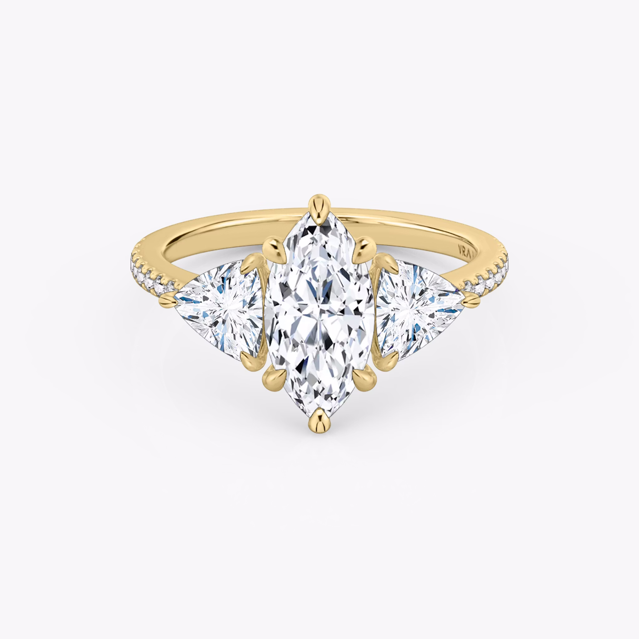 The Three Stone | Marquise | 18k | Yellow Gold | bandAccent: Pavé | sideStoneCarat: 0.50ct | sideStoneShape: Trillion | diamondOrientation: vertical | caratWeight: other