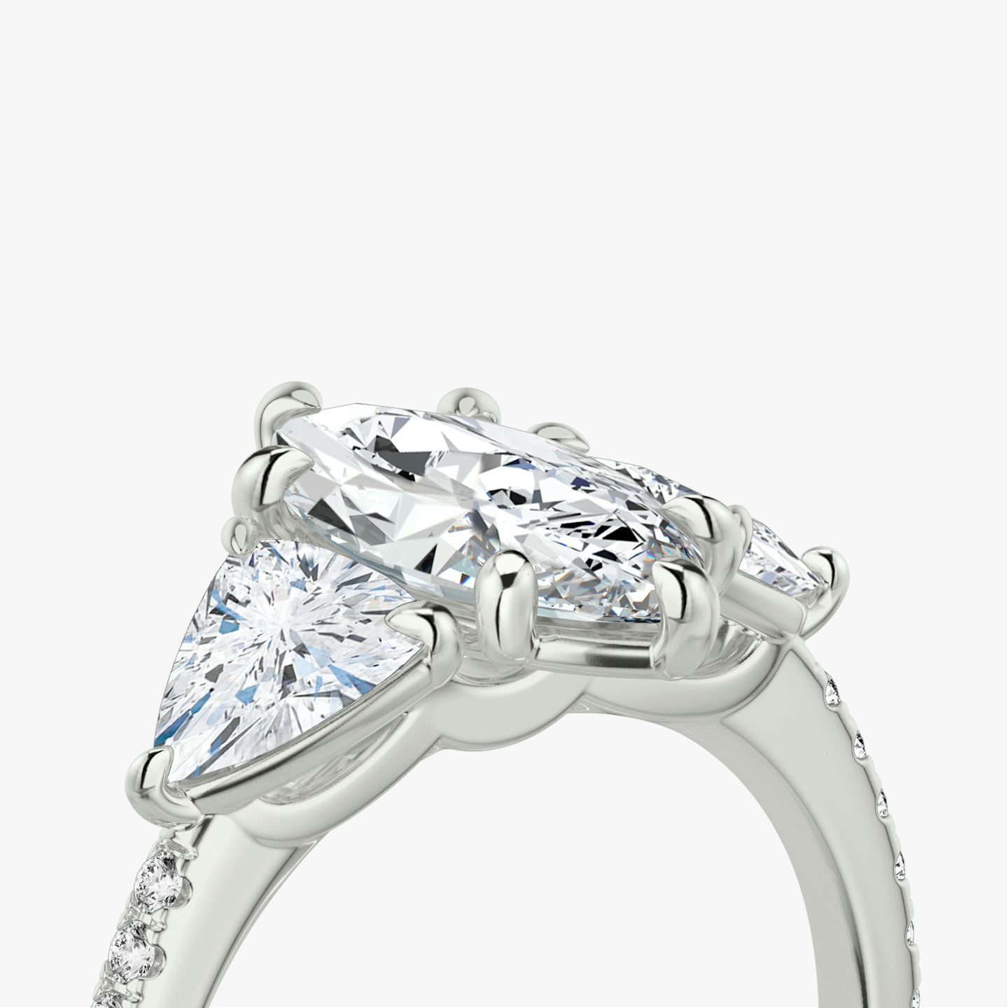 The Three Stone | Marquise | Platinum | bandAccent: Pavé | sideStoneCarat: 0.50ct | sideStoneShape: Trillion | diamondOrientation: vertical | caratWeight: other