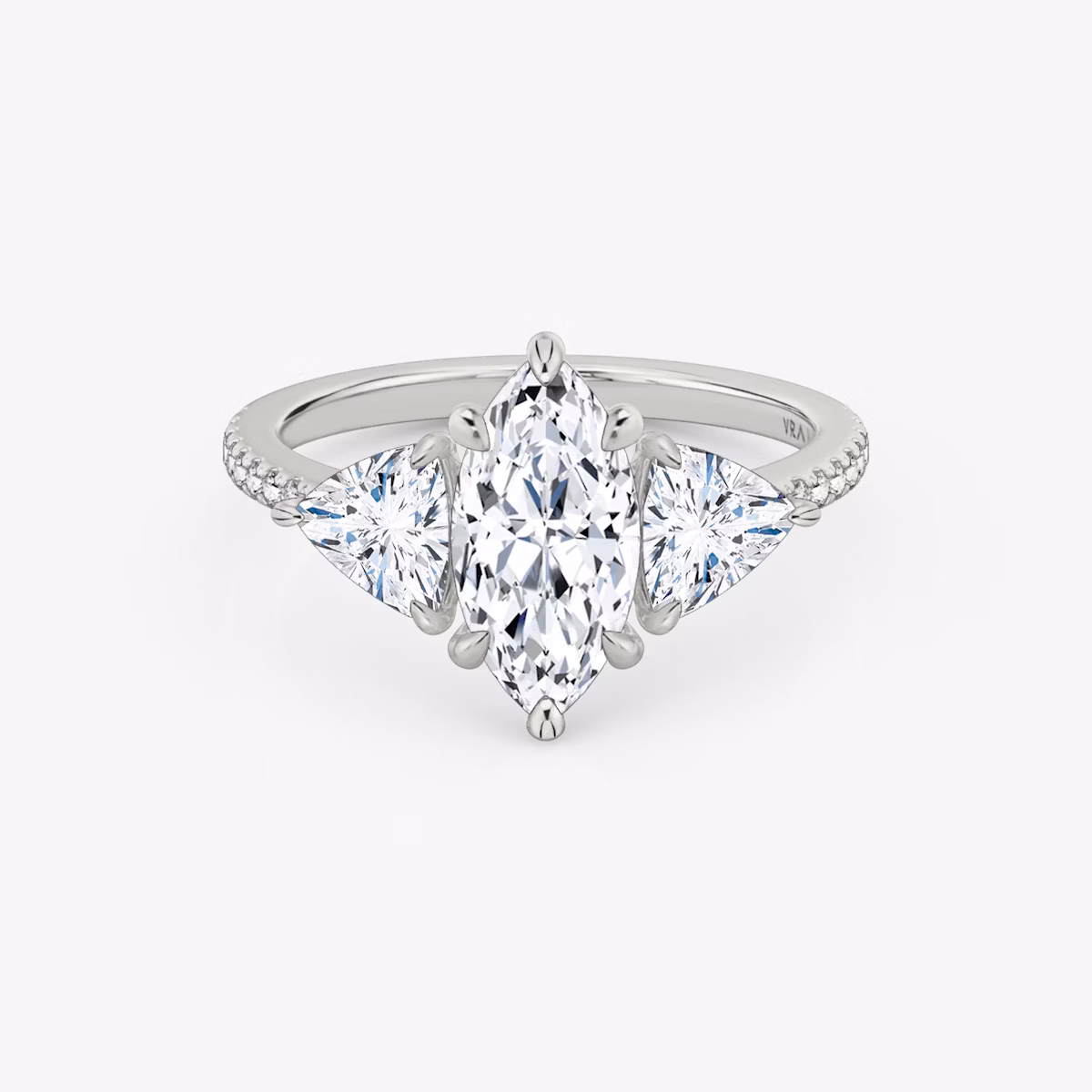 The Three Stone | Marquise | Platinum | bandAccent: Pavé | sideStoneCarat: 0.50ct | sideStoneShape: Trillion | diamondOrientation: vertical | caratWeight: other