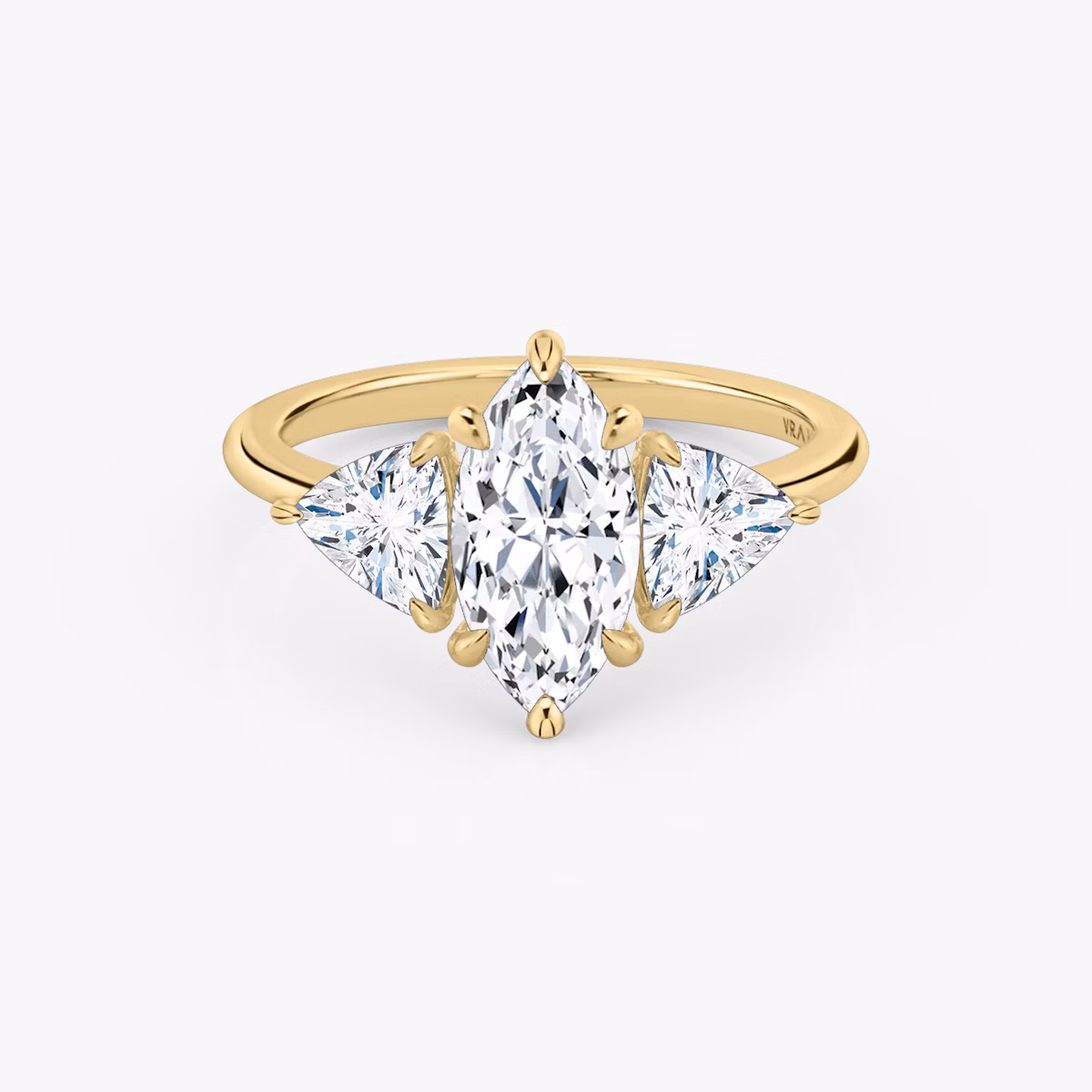 The Three Stone | Marquise | 18k | Yellow Gold | bandAccent: Plain | sideStoneCarat: 0.50ct | sideStoneShape: Trillion | diamondOrientation: vertical | caratWeight: other
