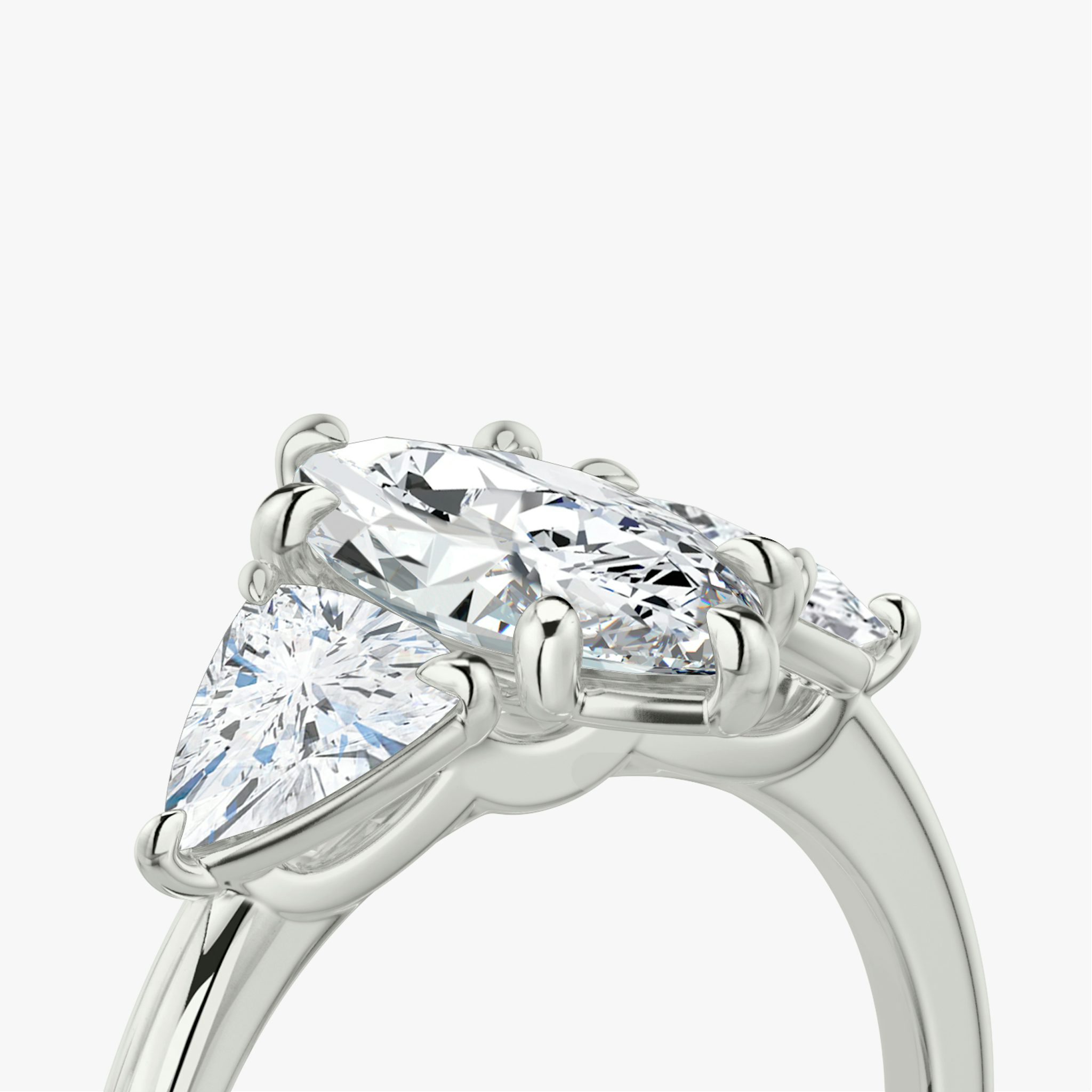 The Three Stone | Marquise | 18k | White Gold | bandAccent: Plain | sideStoneCarat: 0.50ct | sideStoneShape: Trillion | diamondOrientation: vertical | caratWeight: other