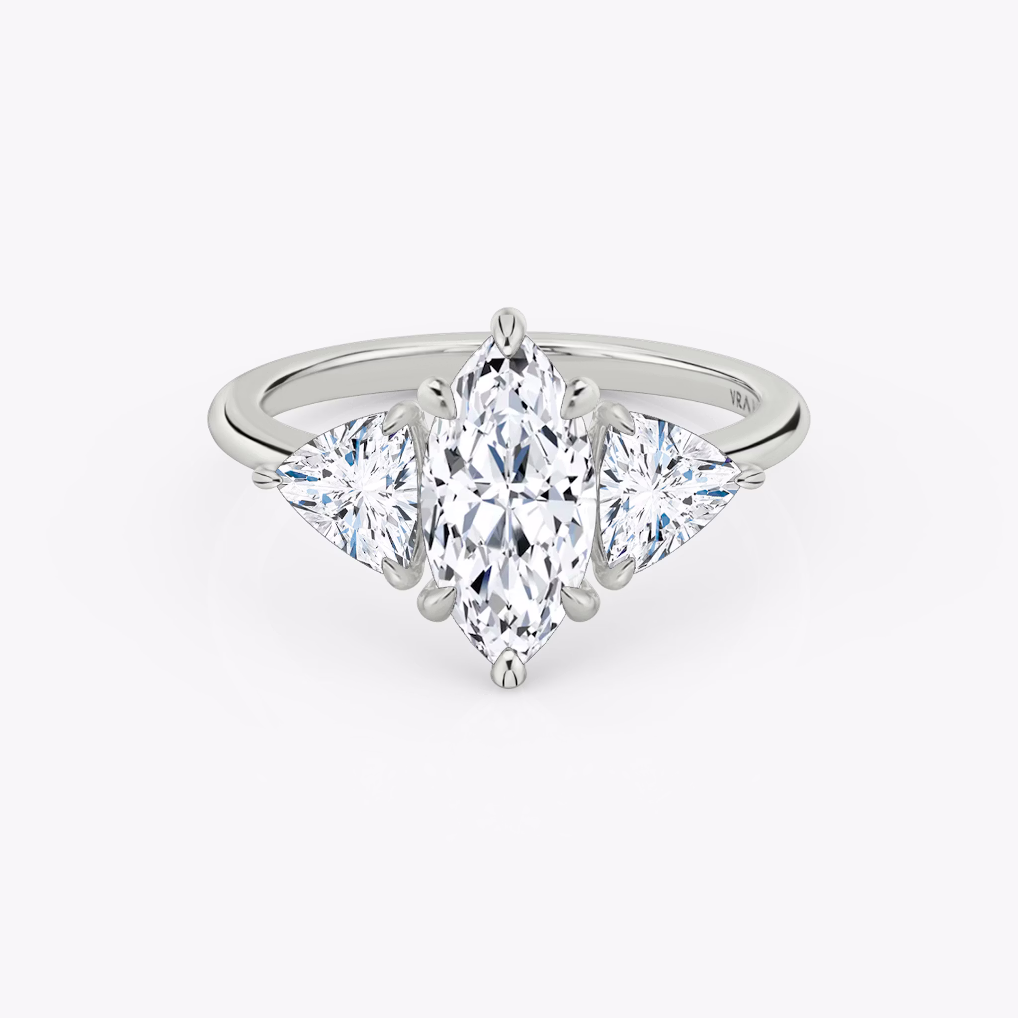 The Three Stone | Marquise | 18k | White Gold | bandAccent: Plain | sideStoneCarat: 0.50ct | sideStoneShape: Trillion | diamondOrientation: vertical | caratWeight: other