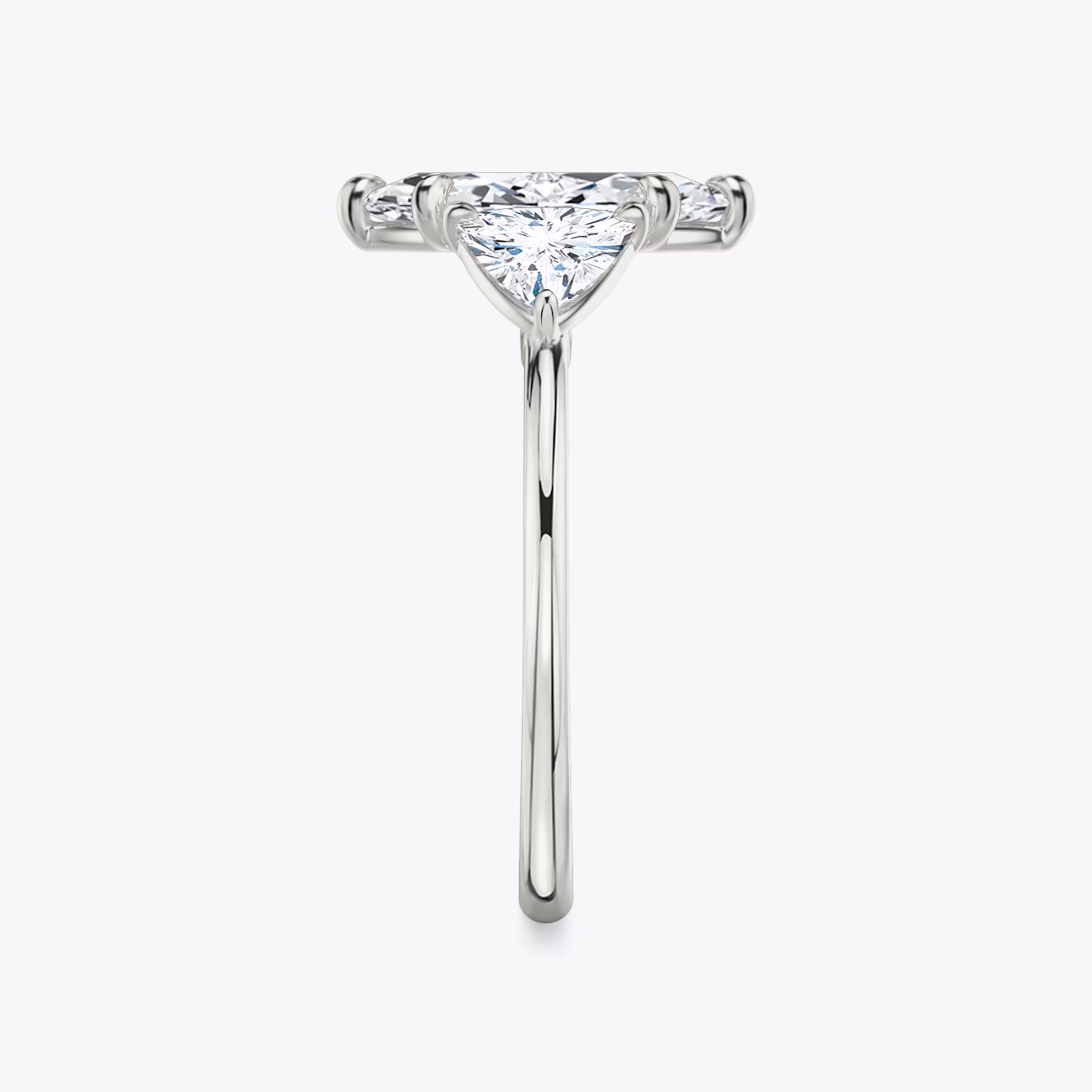 The Three Stone | Marquise | 18k | White Gold | bandAccent: Plain | sideStoneCarat: 0.50ct | sideStoneShape: Trillion | diamondOrientation: vertical | caratWeight: other