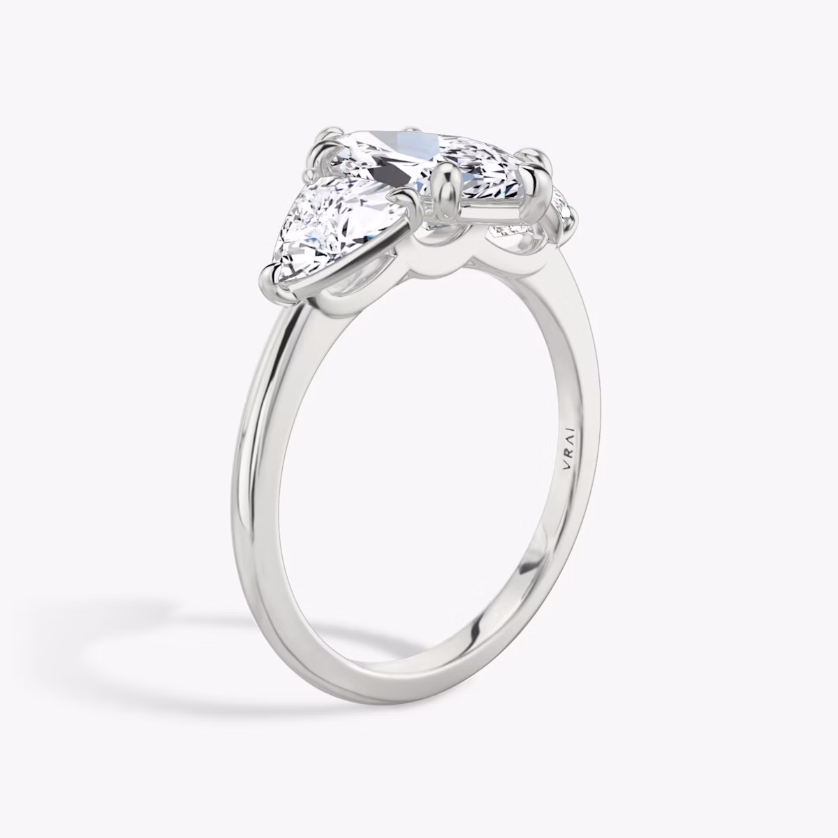 The Three Stone | Marquise | Platinum | bandAccent: Plain | sideStoneCarat: 0.50ct | sideStoneShape: Trillion | diamondOrientation: vertical | caratWeight: other