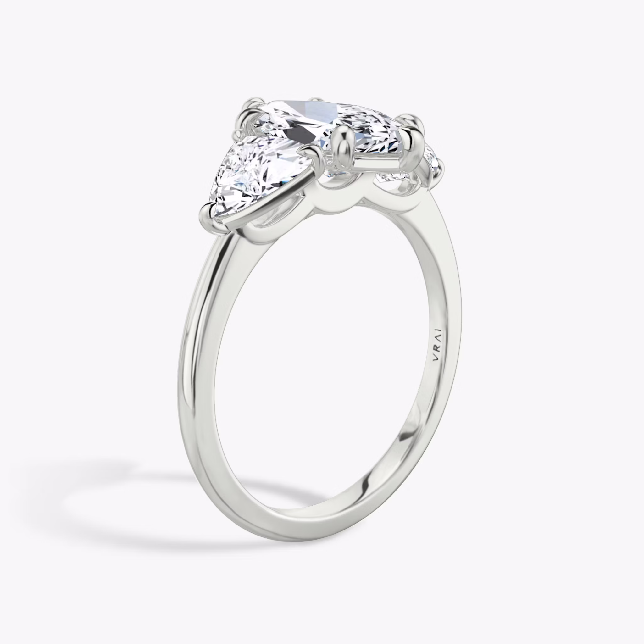 The Three Stone | Marquise | 18k | White Gold | bandAccent: Plain | sideStoneCarat: 0.50ct | sideStoneShape: Trillion | diamondOrientation: vertical | caratWeight: other