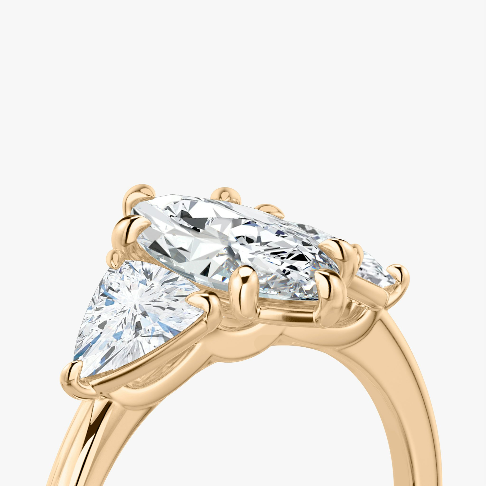 The Three Stone | Marquise | 14k | Rose Gold | bandAccent: Plain | sideStoneCarat: 0.50ct | sideStoneShape: Trillion | diamondOrientation: vertical | caratWeight: other