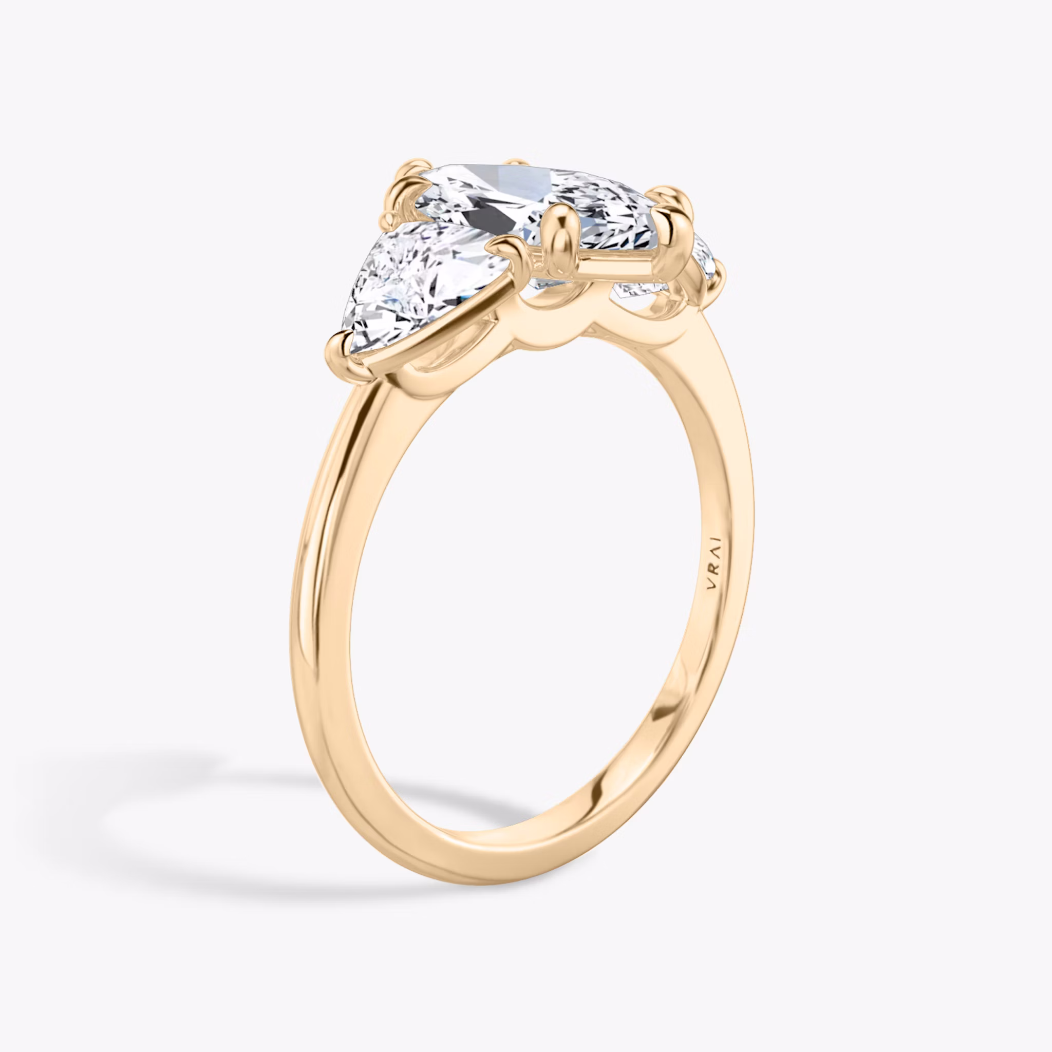 The Three Stone | Marquise | 14k | Rose Gold | bandAccent: Plain | sideStoneCarat: 0.50ct | sideStoneShape: Trillion | diamondOrientation: vertical | caratWeight: other