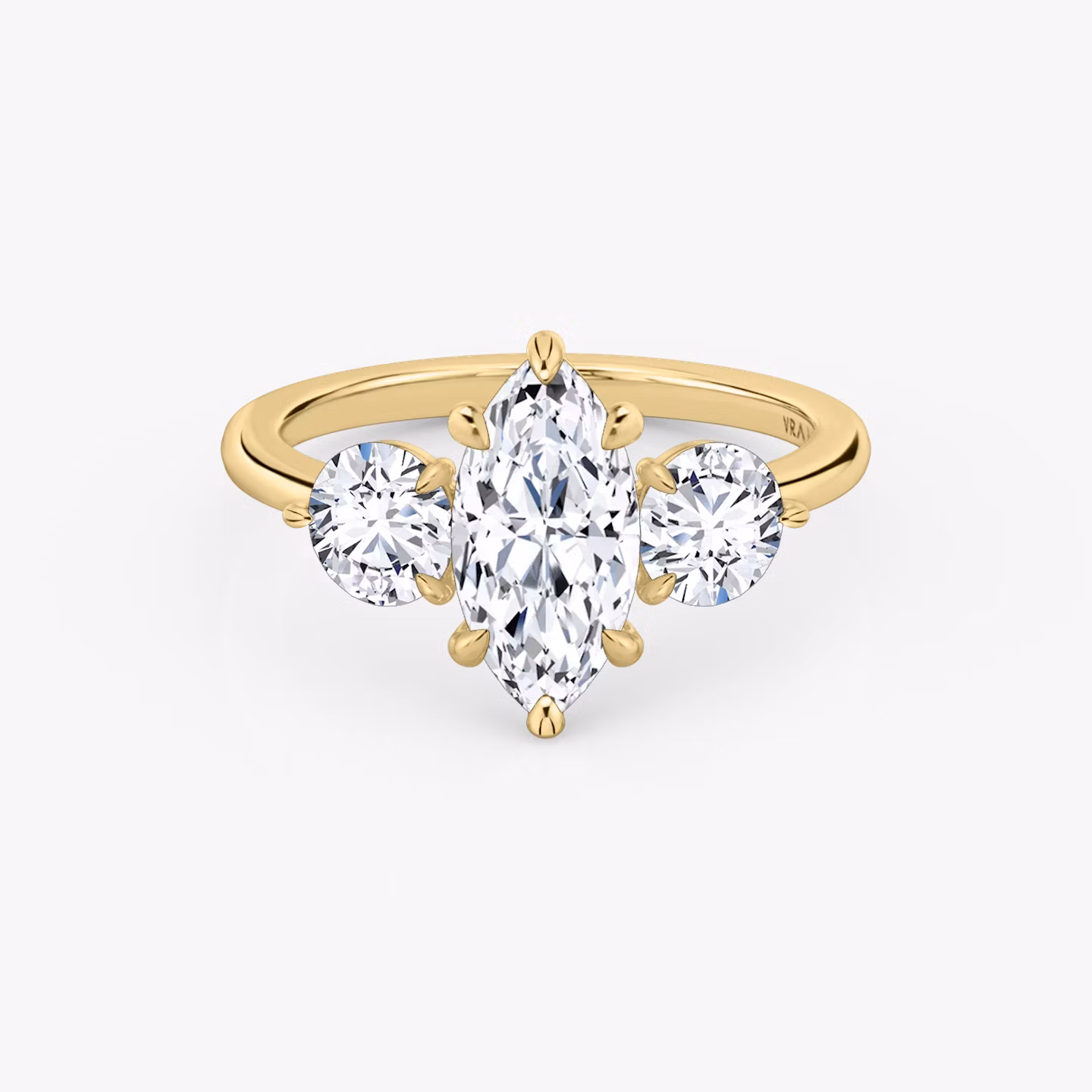 The Three Stone | Marquise | 18k | Yellow Gold | bandAccent: Plain | sideStoneCarat: 0.50ct | sideStoneShape: Round Brilliant | diamondOrientation: vertical | caratWeight: other