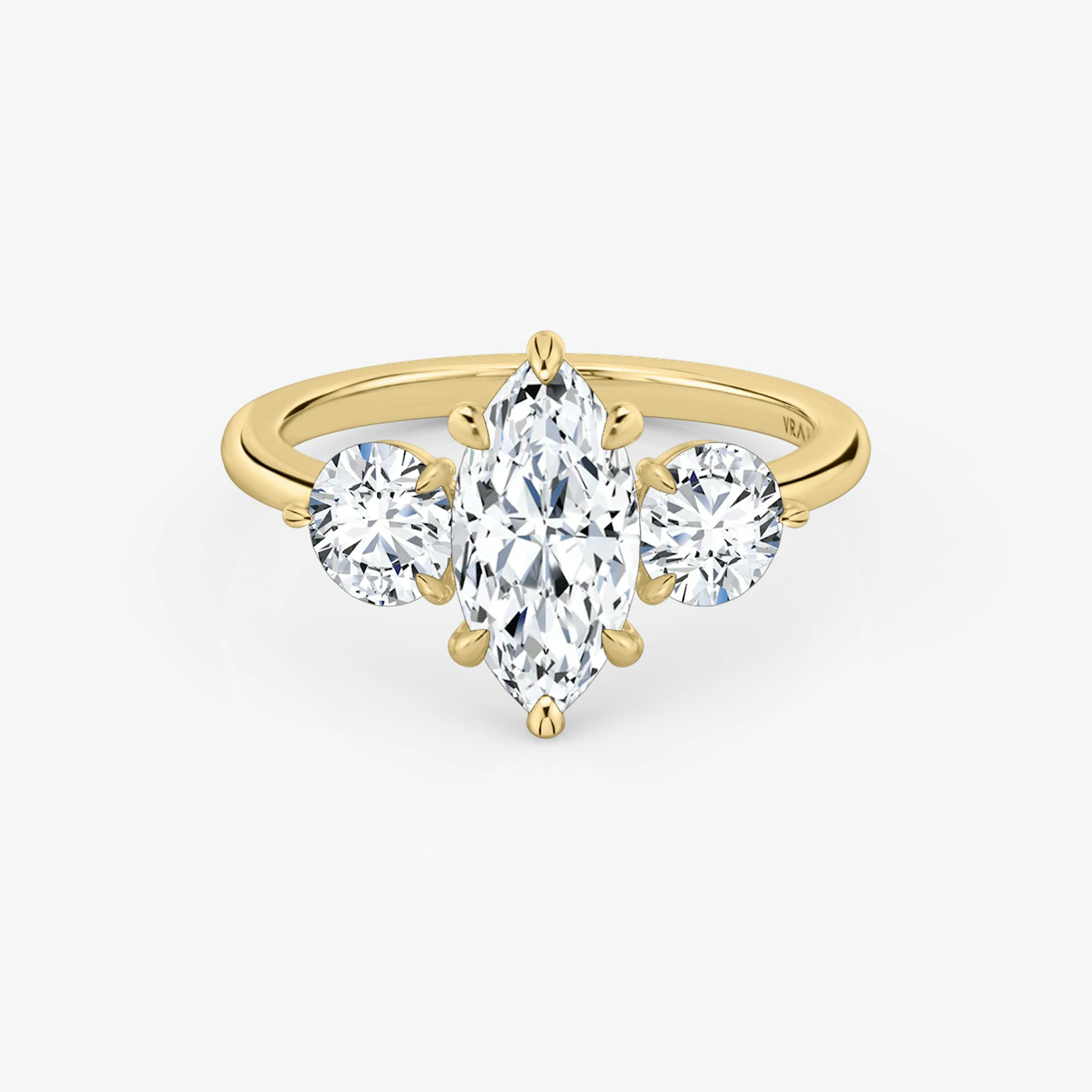 The Three Stone | Marquise | 18k | Yellow Gold | bandAccent: Plain | sideStoneCarat: 0.50ct | sideStoneShape: Round Brilliant | diamondOrientation: vertical | caratWeight: other
