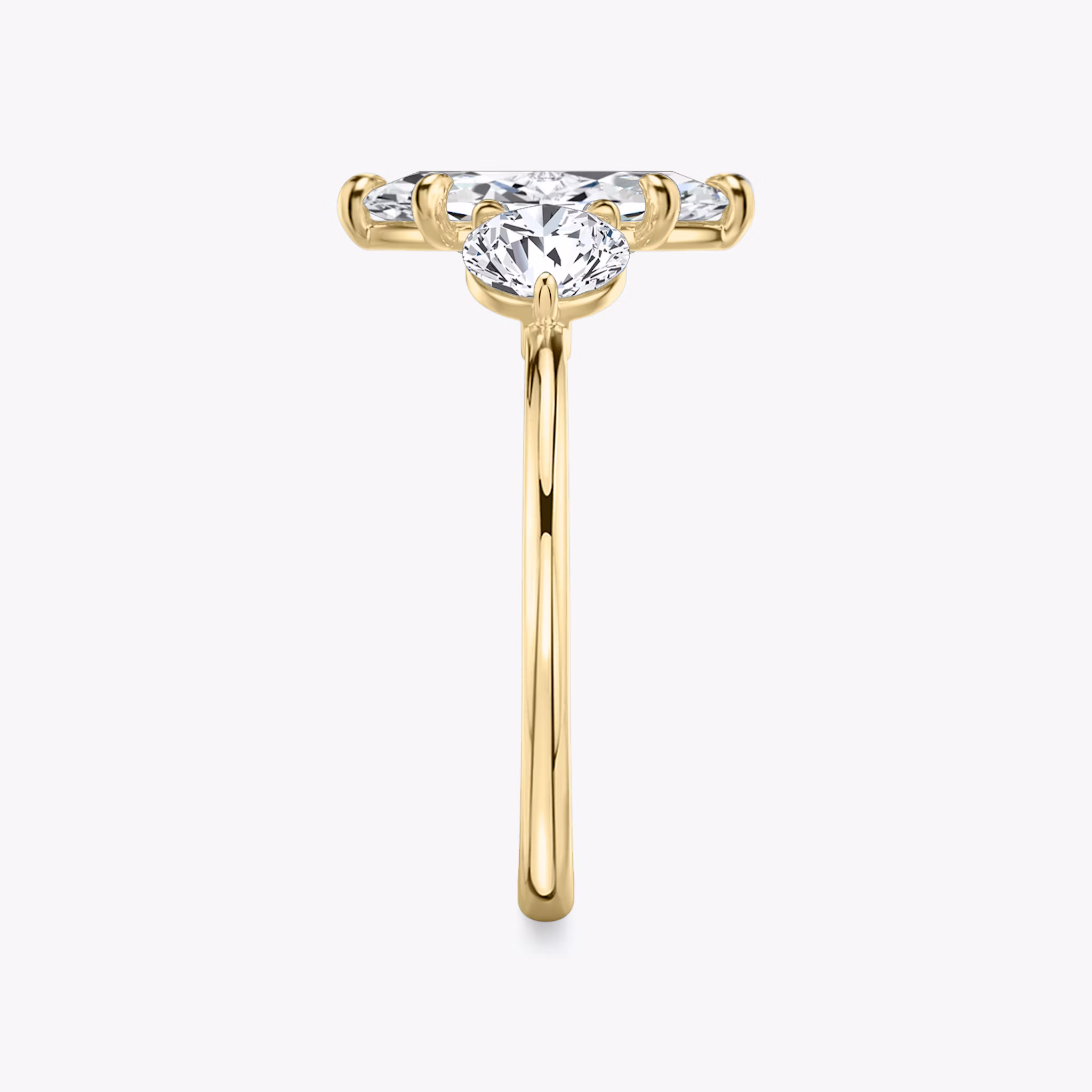 The Three Stone | Marquise | 18k | Yellow Gold | bandAccent: Plain | sideStoneCarat: 0.50ct | sideStoneShape: Round Brilliant | diamondOrientation: vertical | caratWeight: other