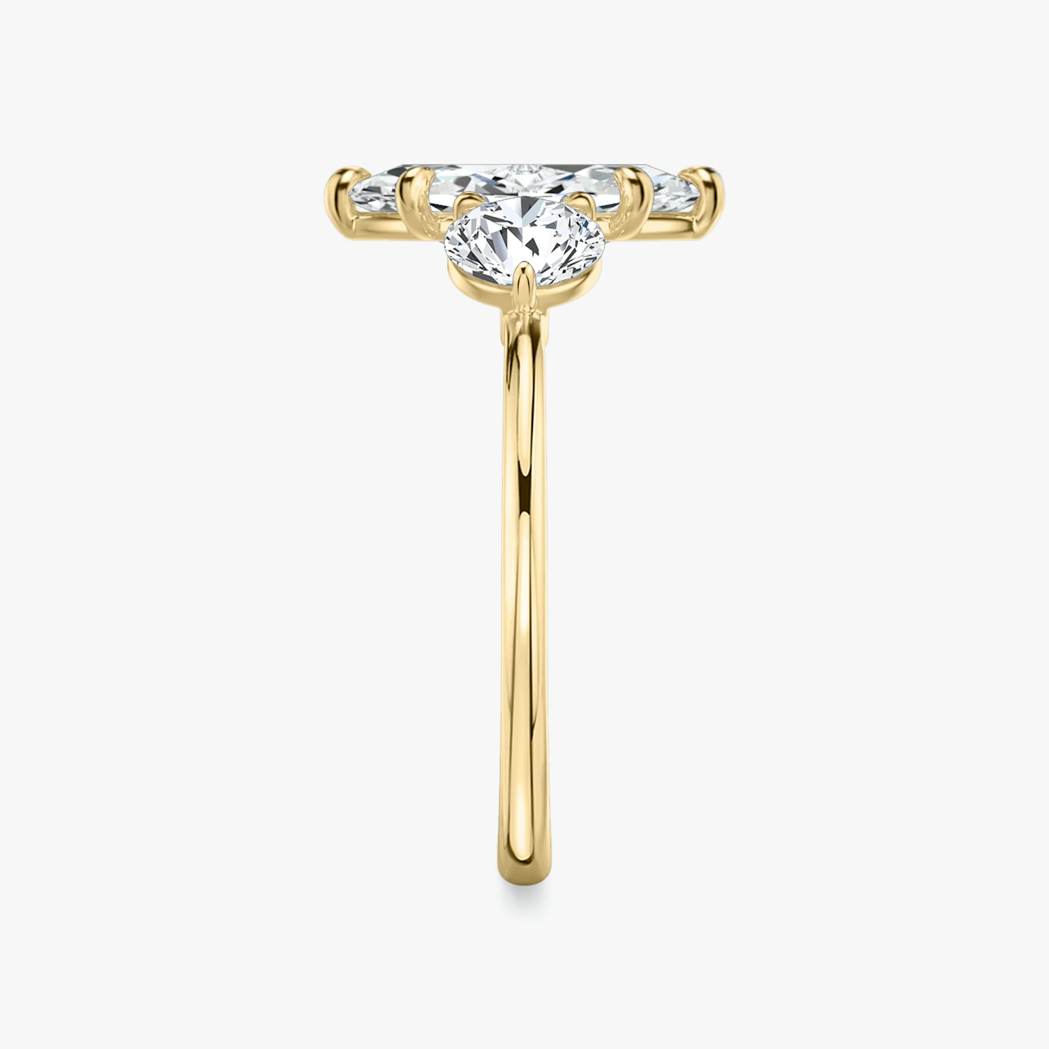 The Three Stone | Marquise | 18k | Yellow Gold | bandAccent: Plain | sideStoneCarat: 0.50ct | sideStoneShape: Round Brilliant | diamondOrientation: vertical | caratWeight: other