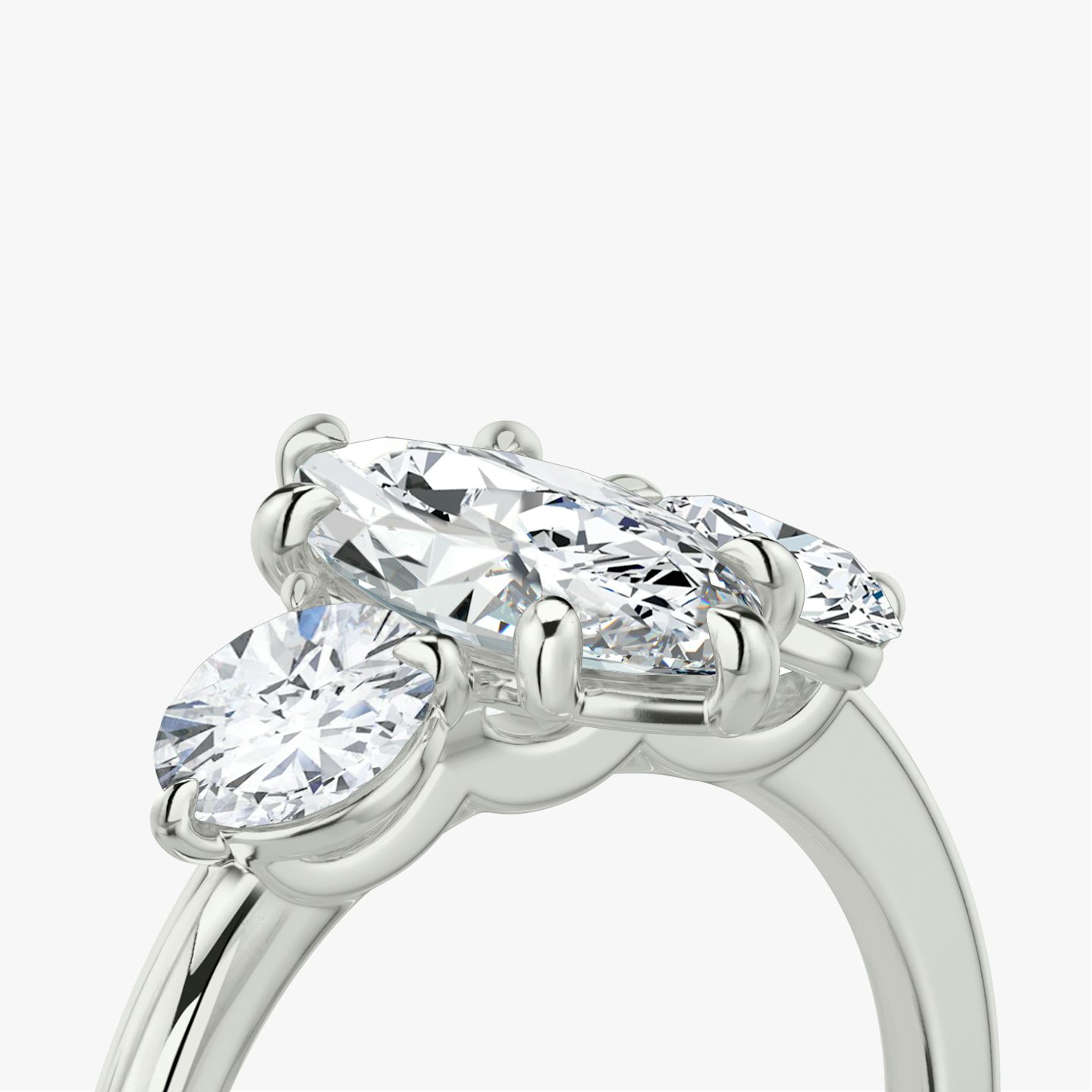 The Three Stone | Marquise | 18k | White Gold | bandAccent: Plain | sideStoneCarat: 0.50ct | sideStoneShape: Round Brilliant | diamondOrientation: vertical | caratWeight: other