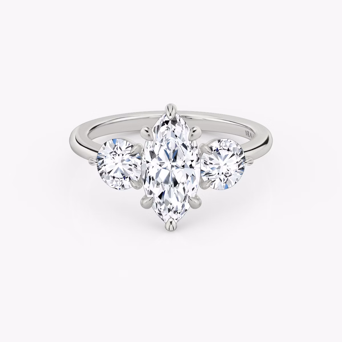 The Three Stone | Marquise | Platinum | bandAccent: Plain | sideStoneCarat: 0.50ct | sideStoneShape: Round Brilliant | diamondOrientation: vertical | caratWeight: other