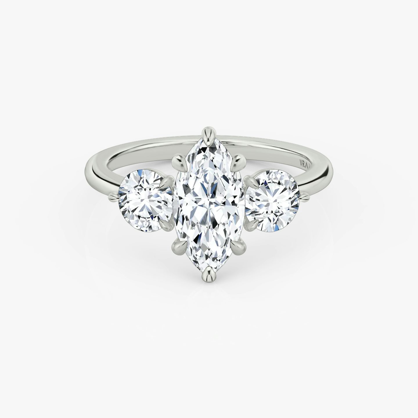 The Three Stone | Marquise | 18k | White Gold | bandAccent: Plain | sideStoneCarat: 0.50ct | sideStoneShape: Round Brilliant | diamondOrientation: vertical | caratWeight: other