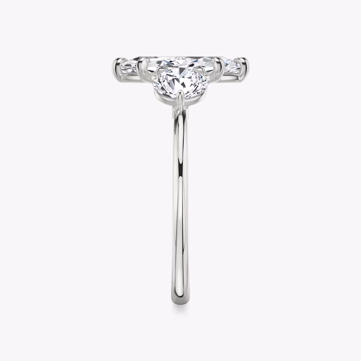 The Three Stone | Marquise | Platinum | bandAccent: Plain | sideStoneCarat: 0.50ct | sideStoneShape: Round Brilliant | diamondOrientation: vertical | caratWeight: other