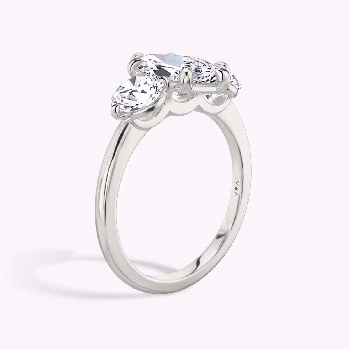 The Three Stone | Marquise | Platinum | bandAccent: Plain | sideStoneCarat: 0.50ct | sideStoneShape: Round Brilliant | diamondOrientation: vertical | caratWeight: other